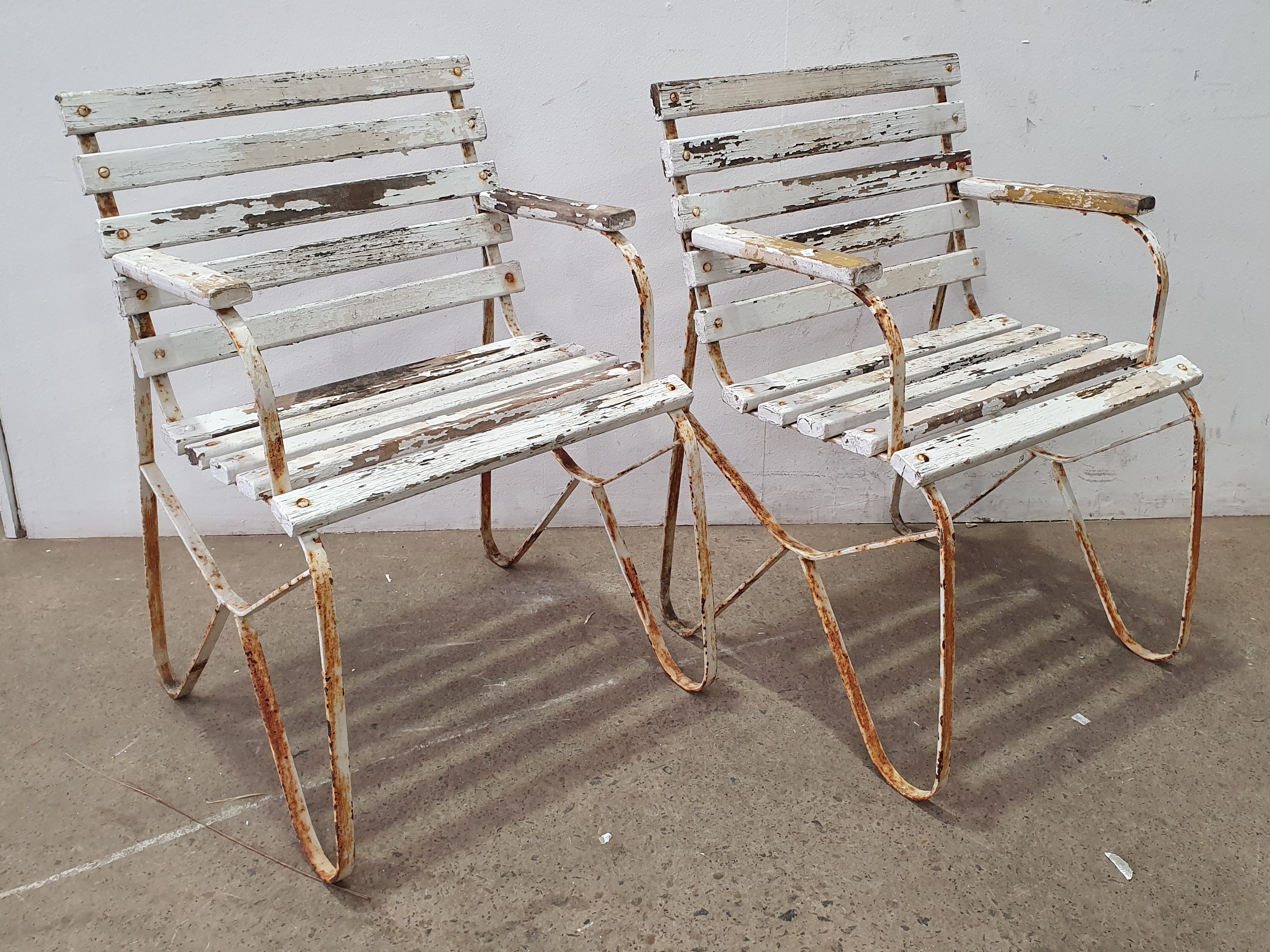 A Pair Of Outdoor Chairs