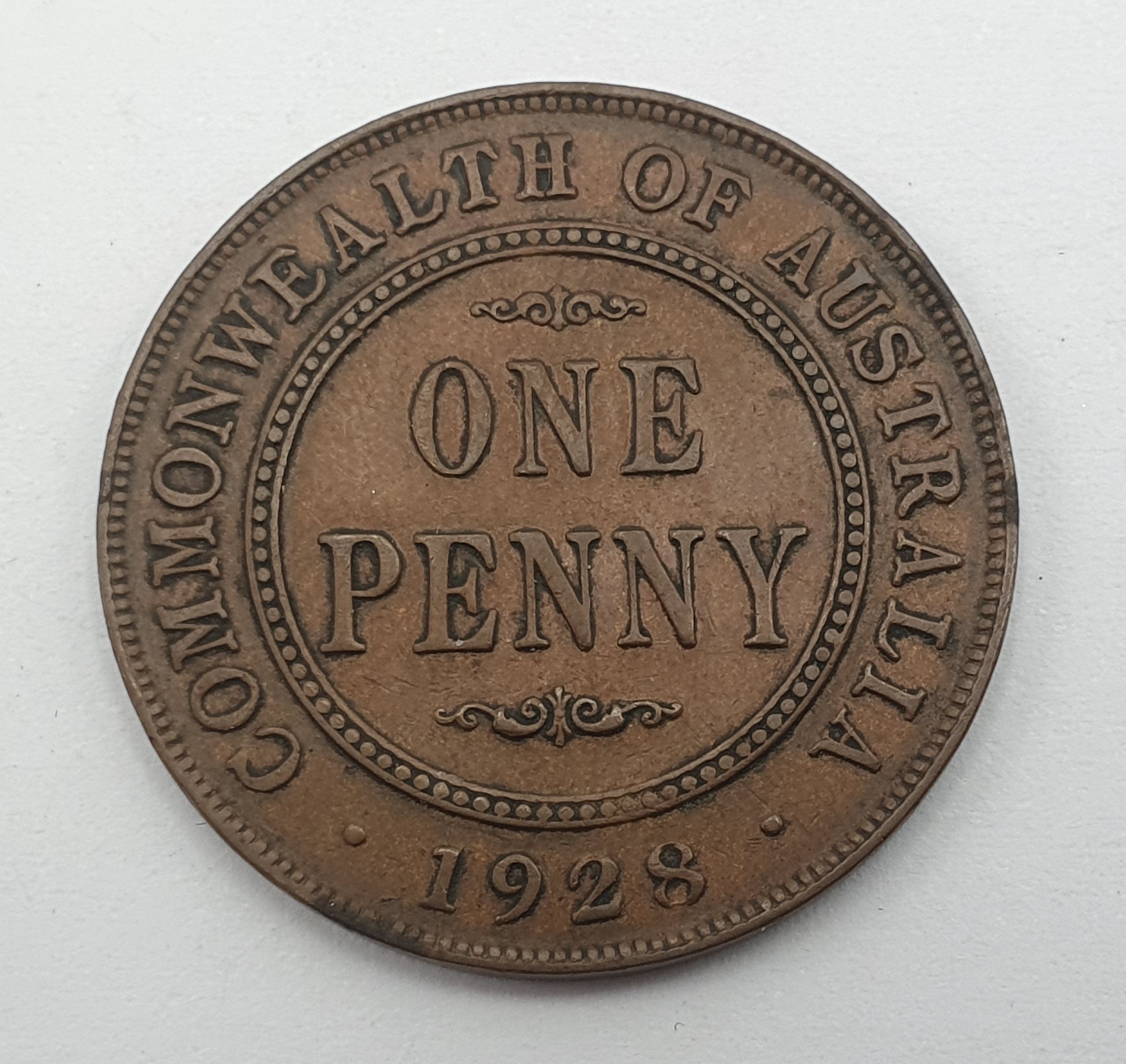 An Australian 1928 'Broken 8' Penny