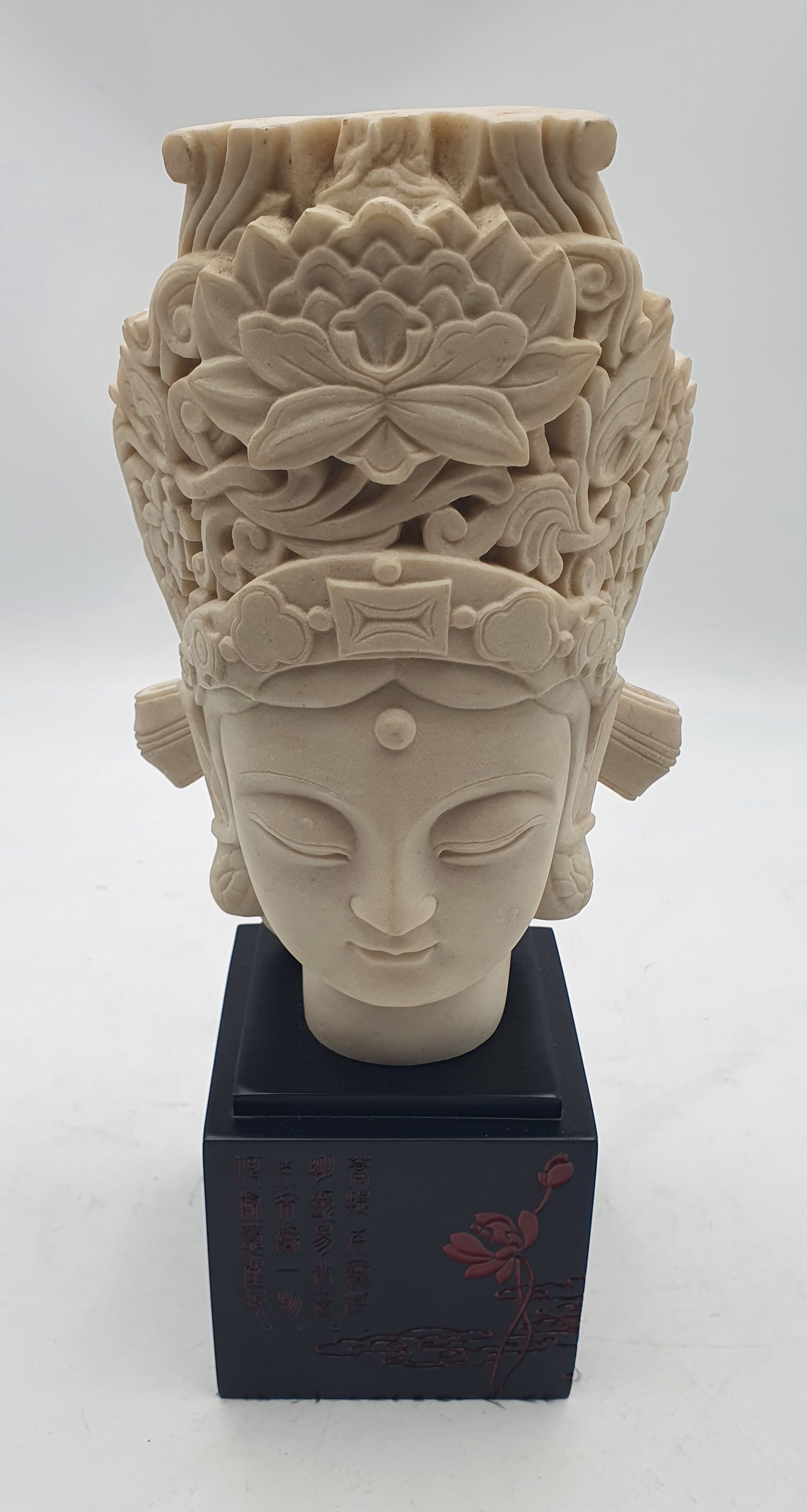 167 · A COMPOSITE STONE BUST OF GUANYIN