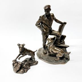 A Heredities figure of a games keeper with his dog together with a further games keeper, H. 25cm. With box.