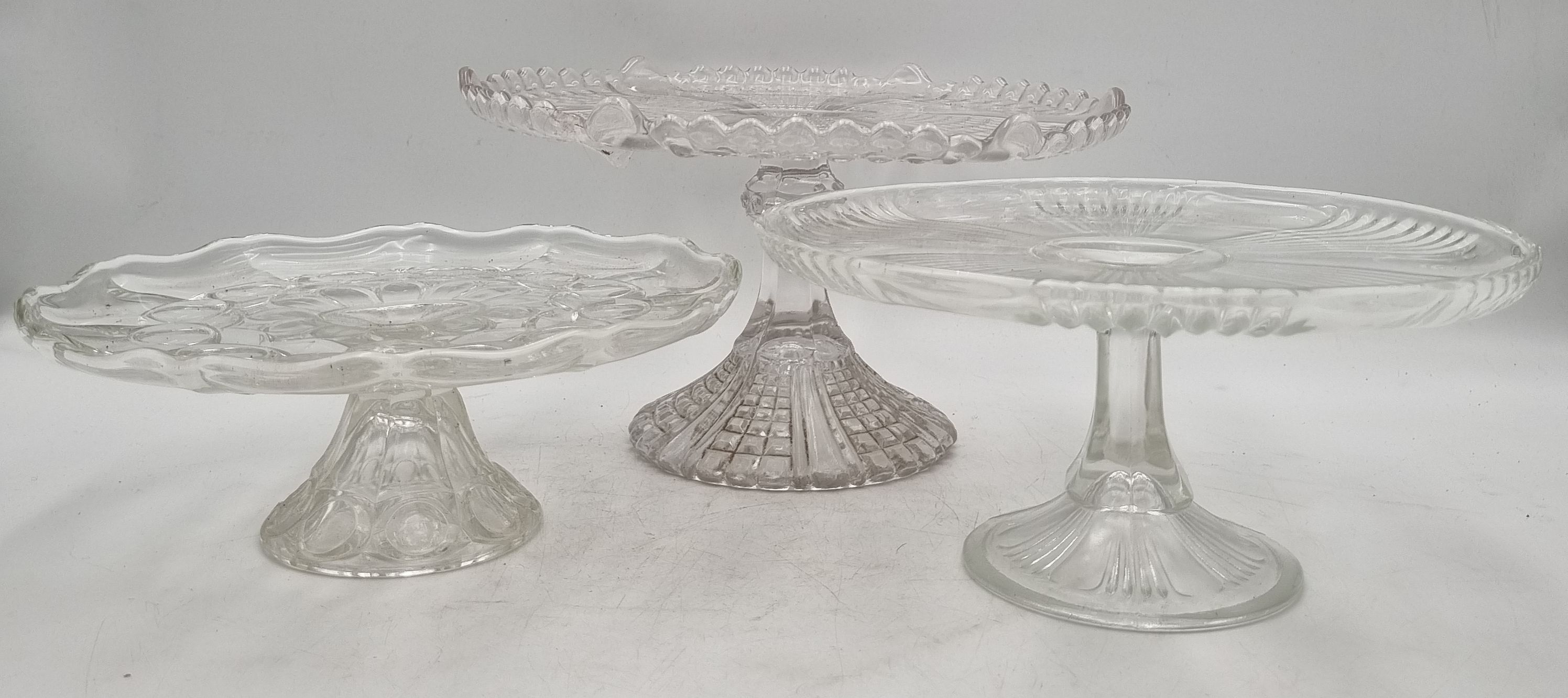 615 · THREE DEPRESSION GLASS CAKE STANDS