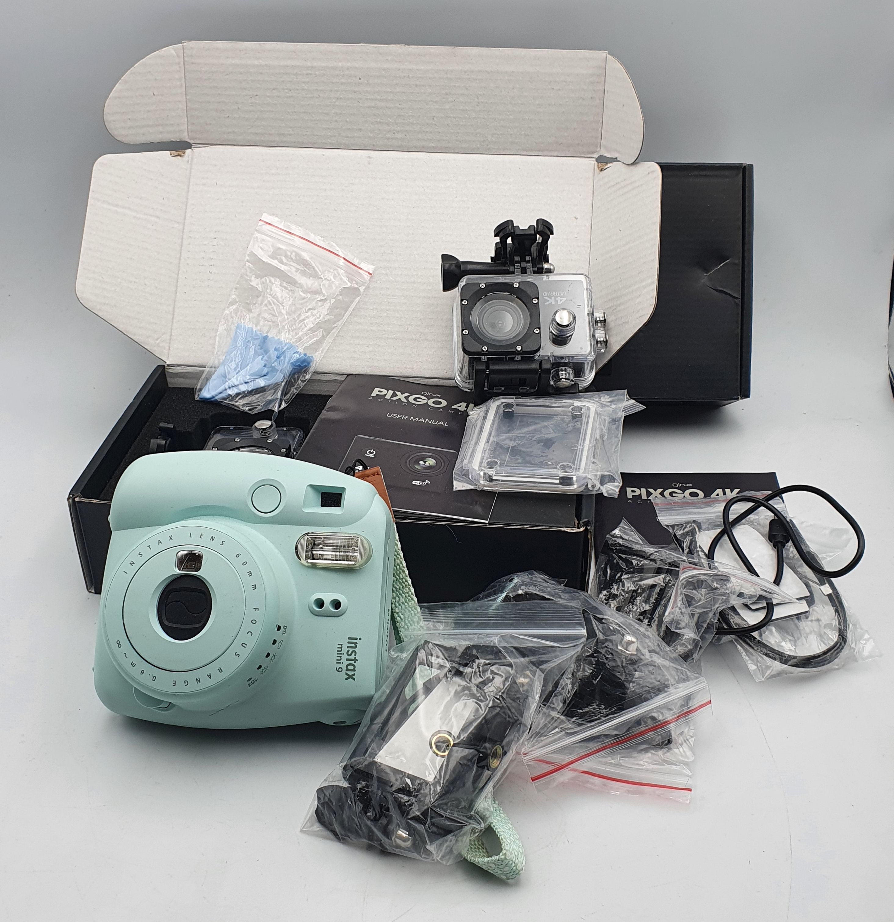 255 · A GROUP OF CAMERA EQUIPMENT