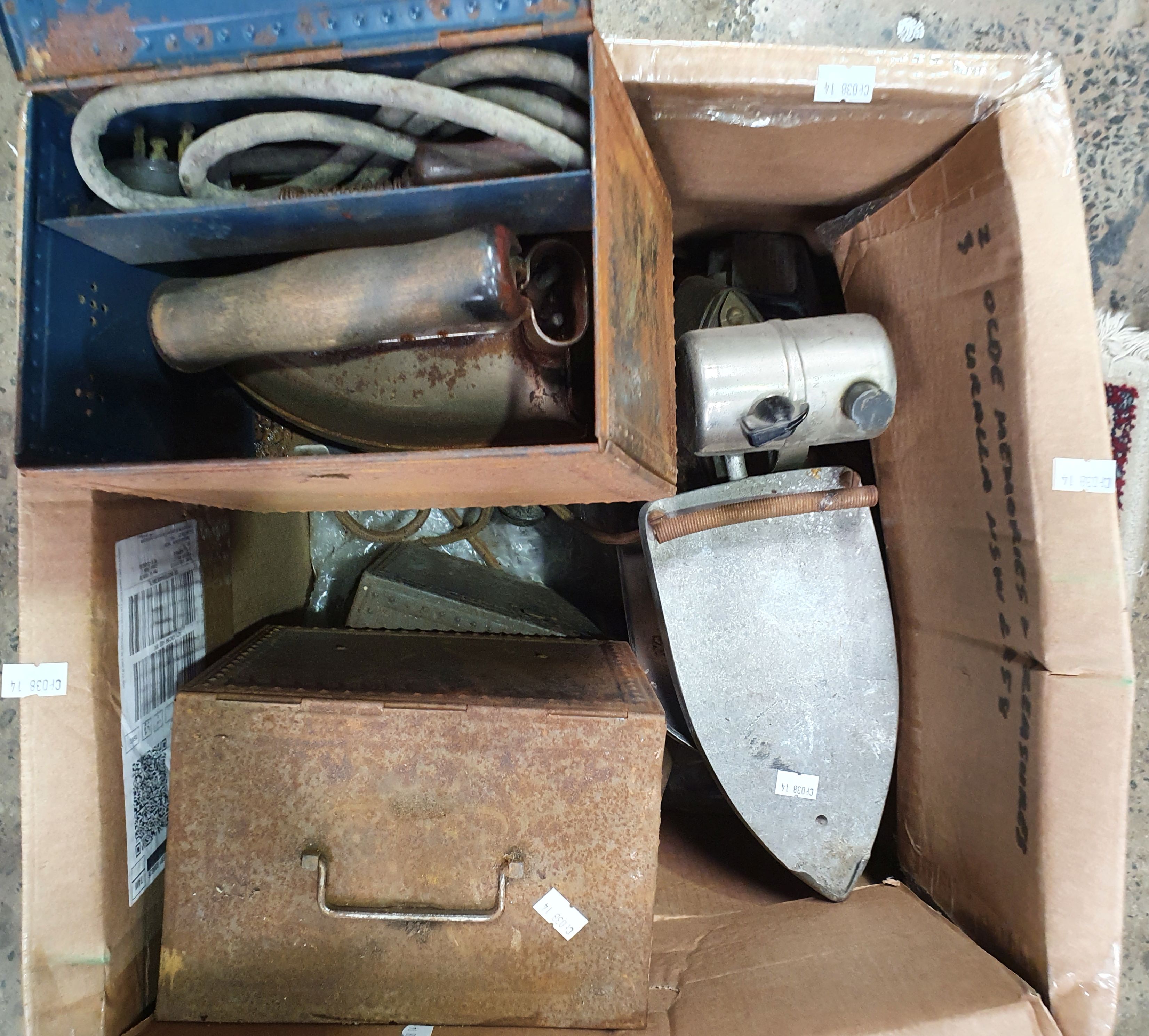 A BOX OF RUSTIC METALWARE