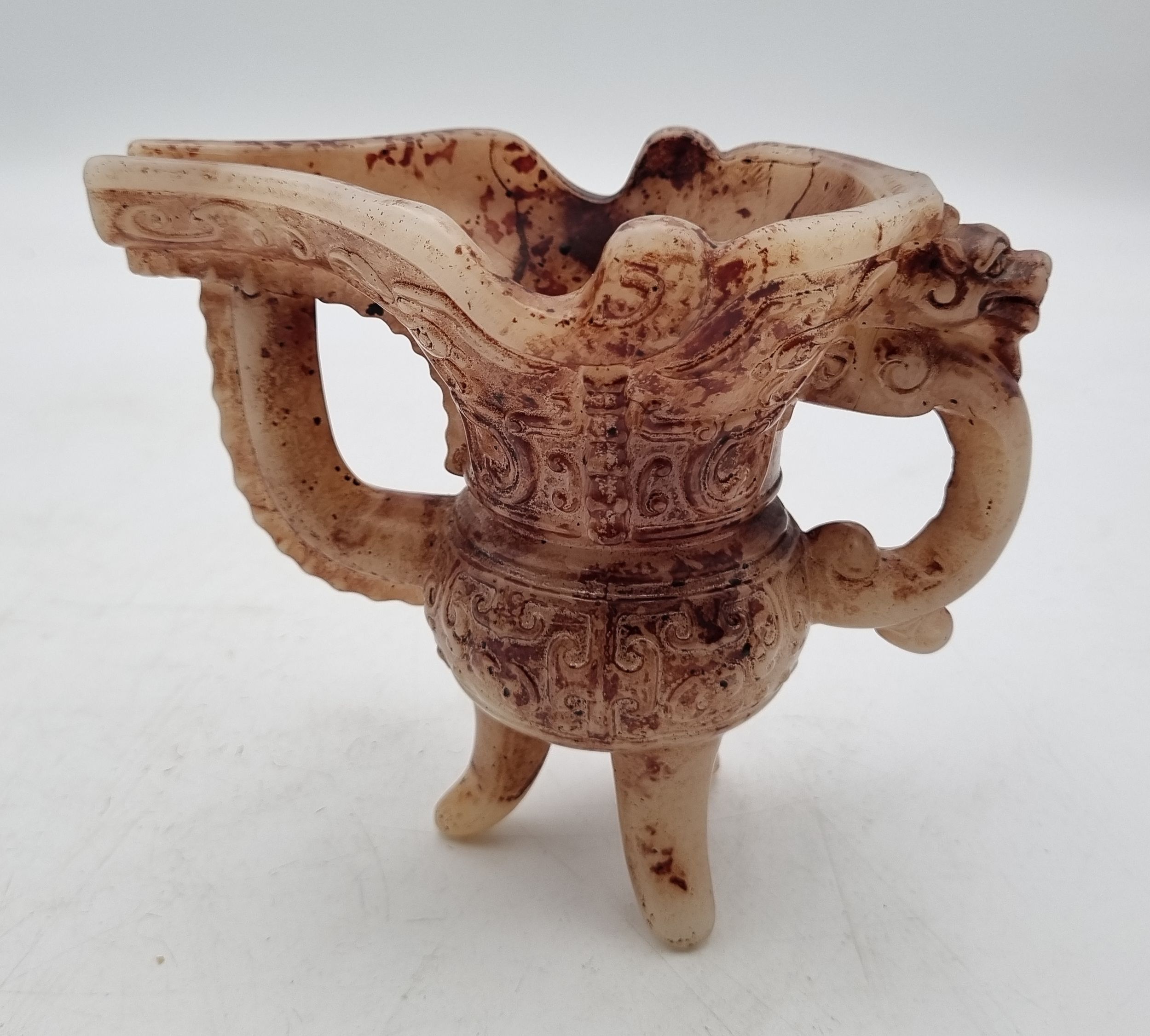 158 · A CHINESE GLASS LIBATION CUP