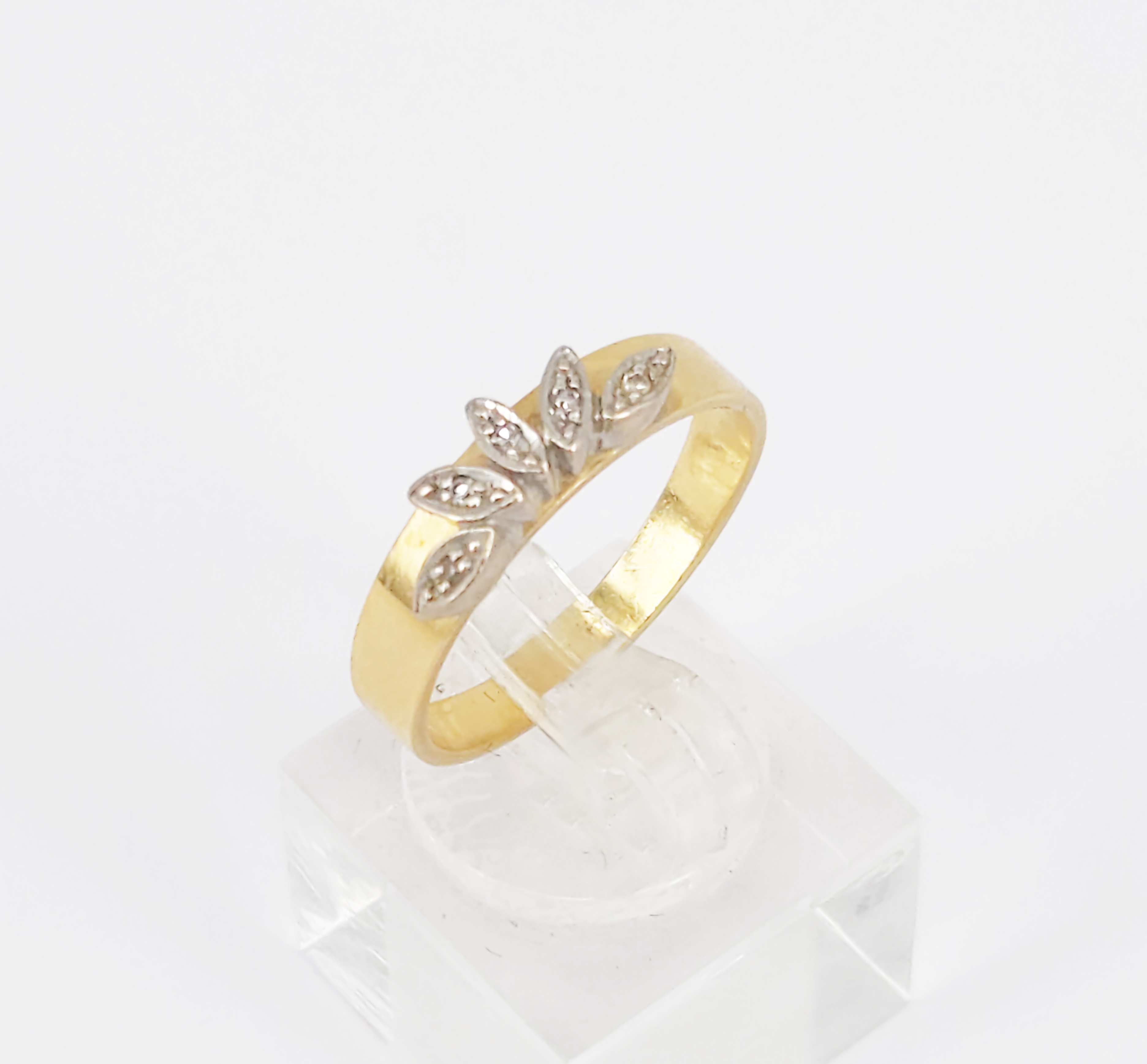 A Diamond And 18ct Gold Band Ring