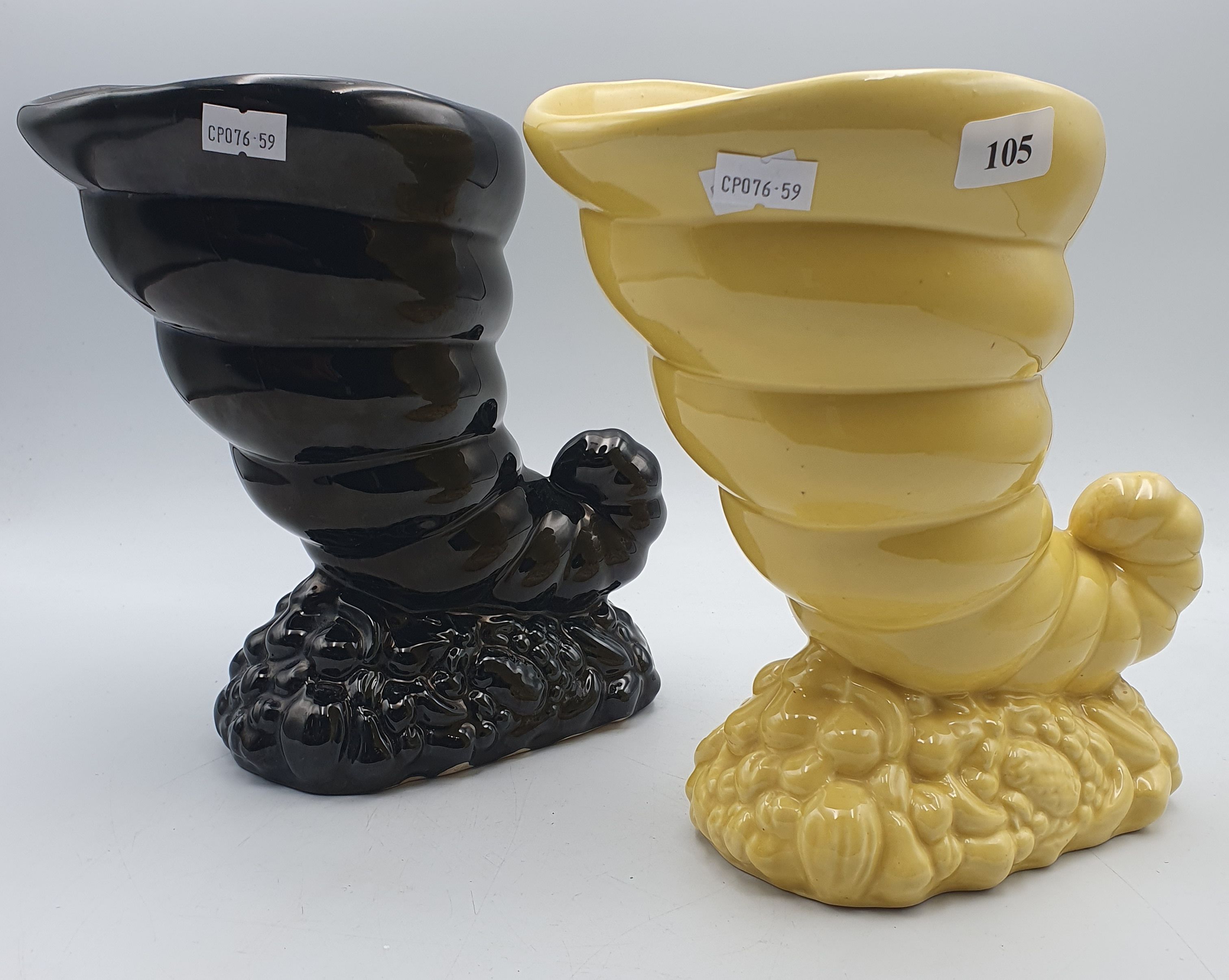 105 · TWO MCP CORNUCOPIA VASES