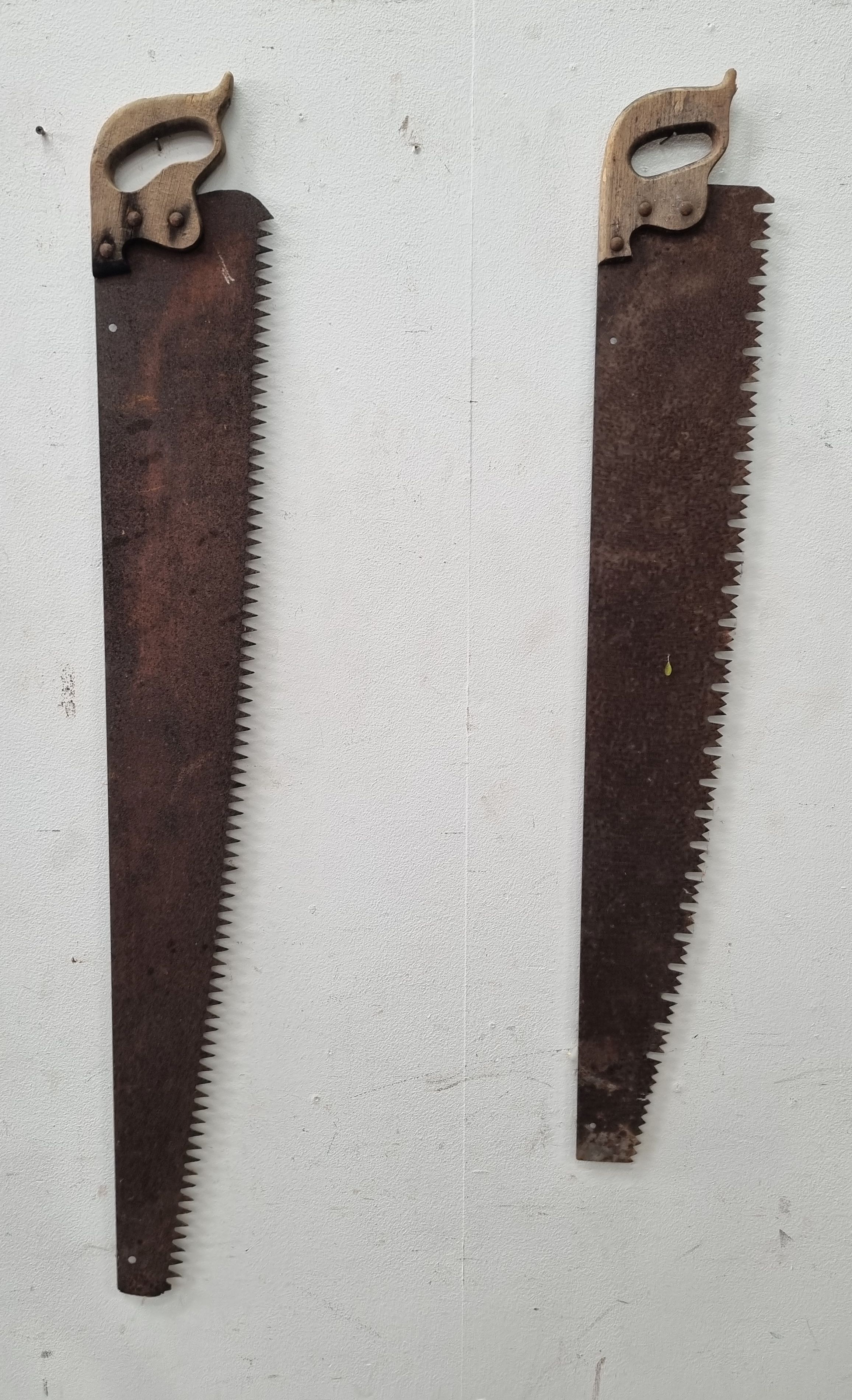 A Pair Of Rustic Saws