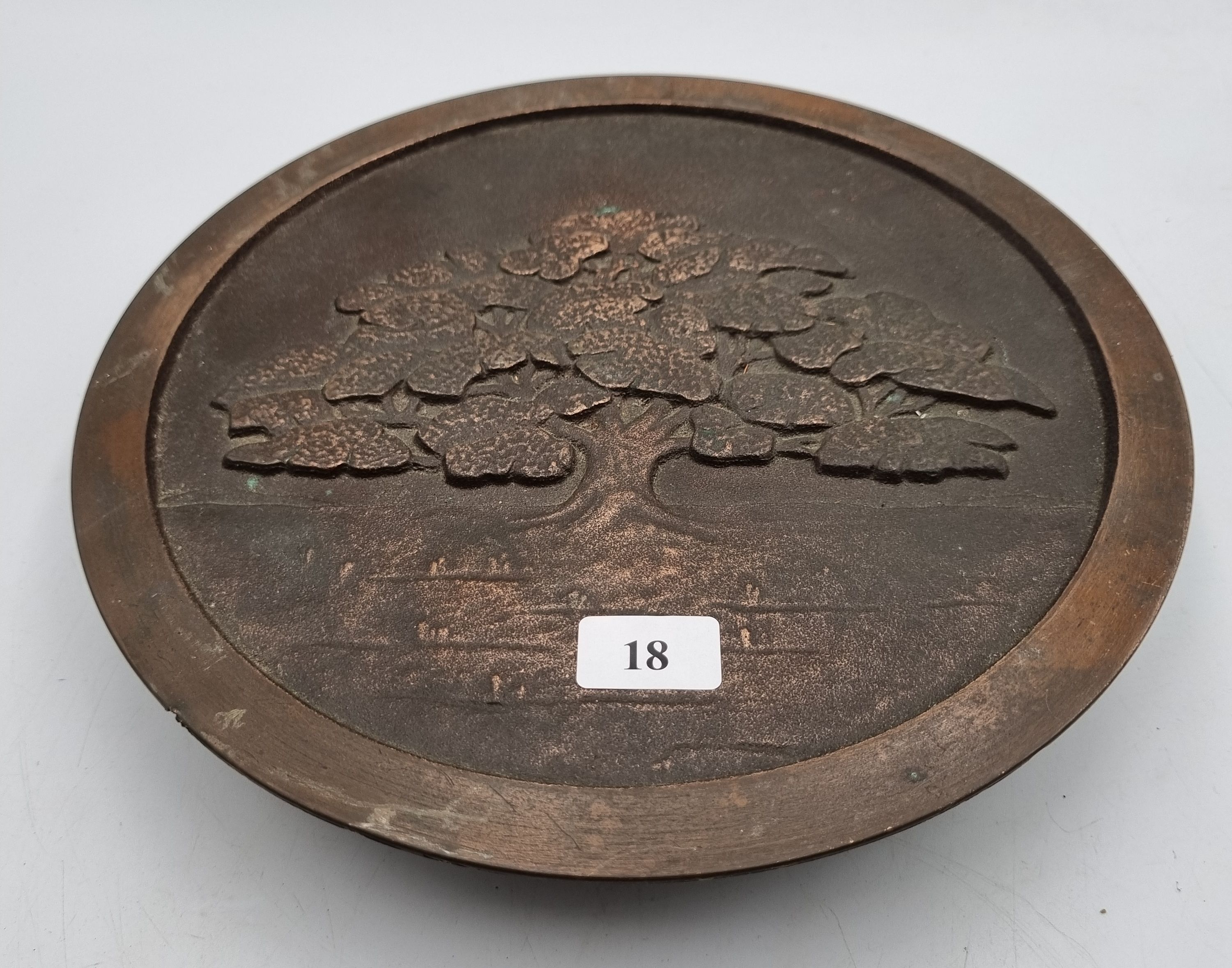 18 · A HEAVY BRONZED TREE MOTIF PLATE