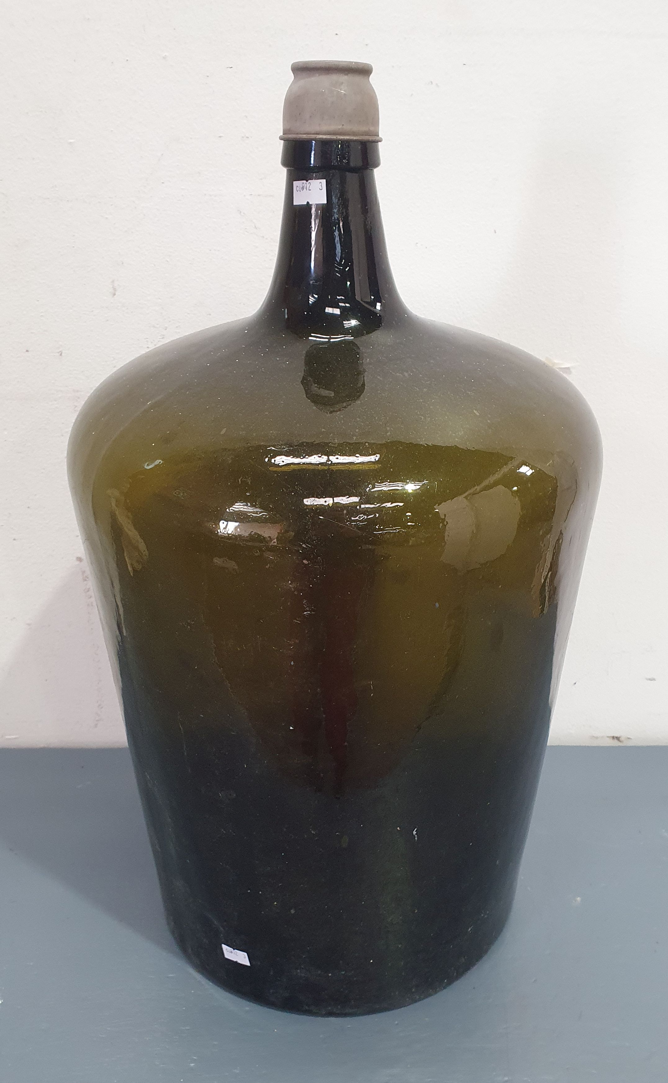 A Large 19th Century Green Glass Demi John