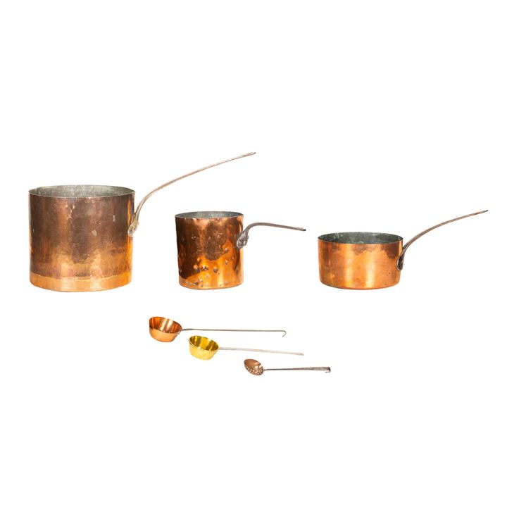 (Lot of 12) A collection of copper cookware with iron handles