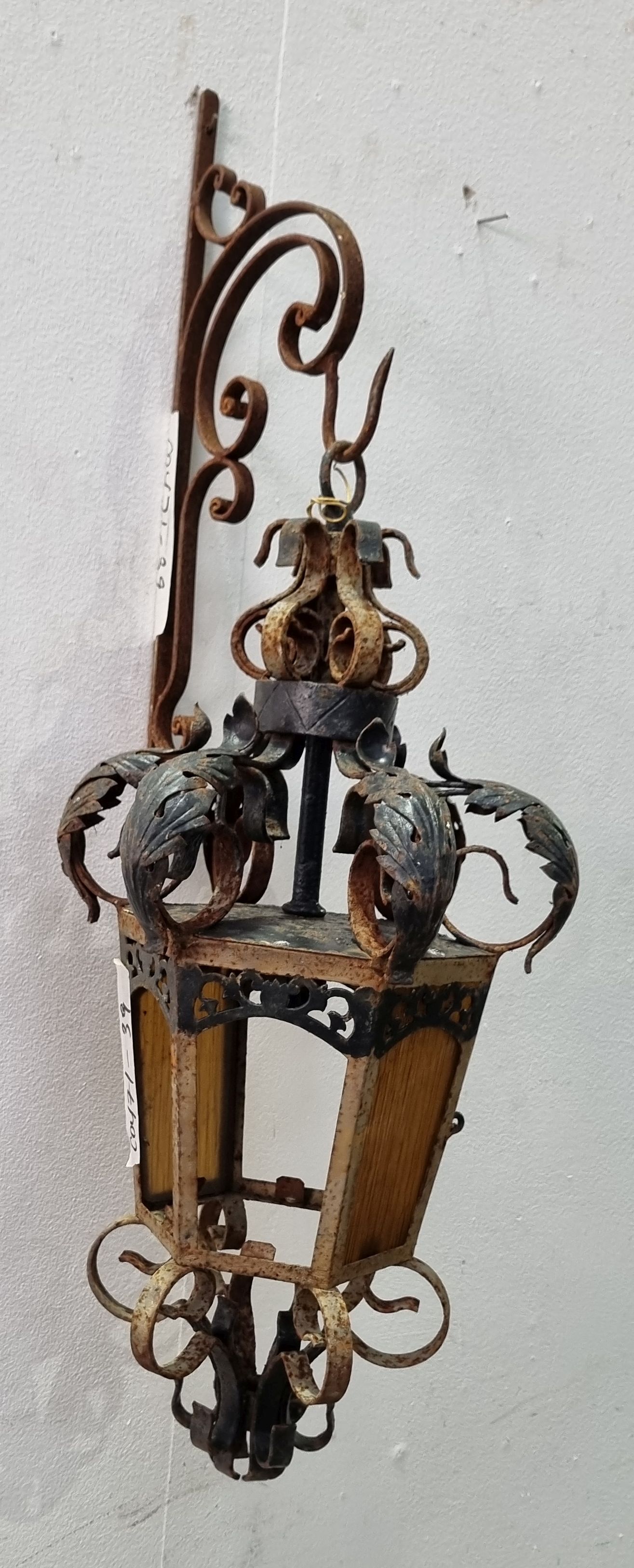 1142 · A WROUGHT IRON HANGING LIGHT