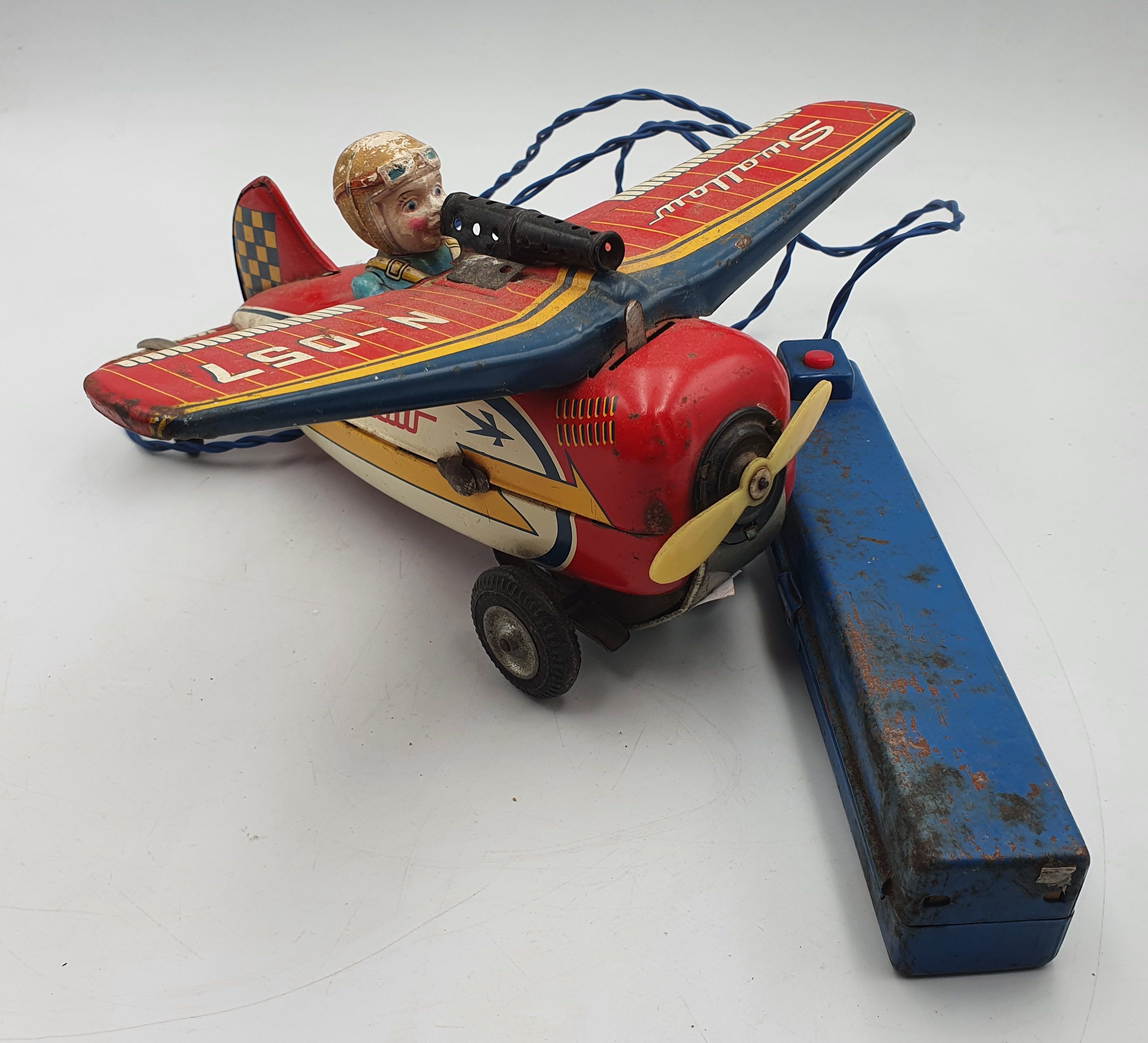 104 · A JAPAN TIN PLATE SWALLOW BATTERY OPERATED PLANE