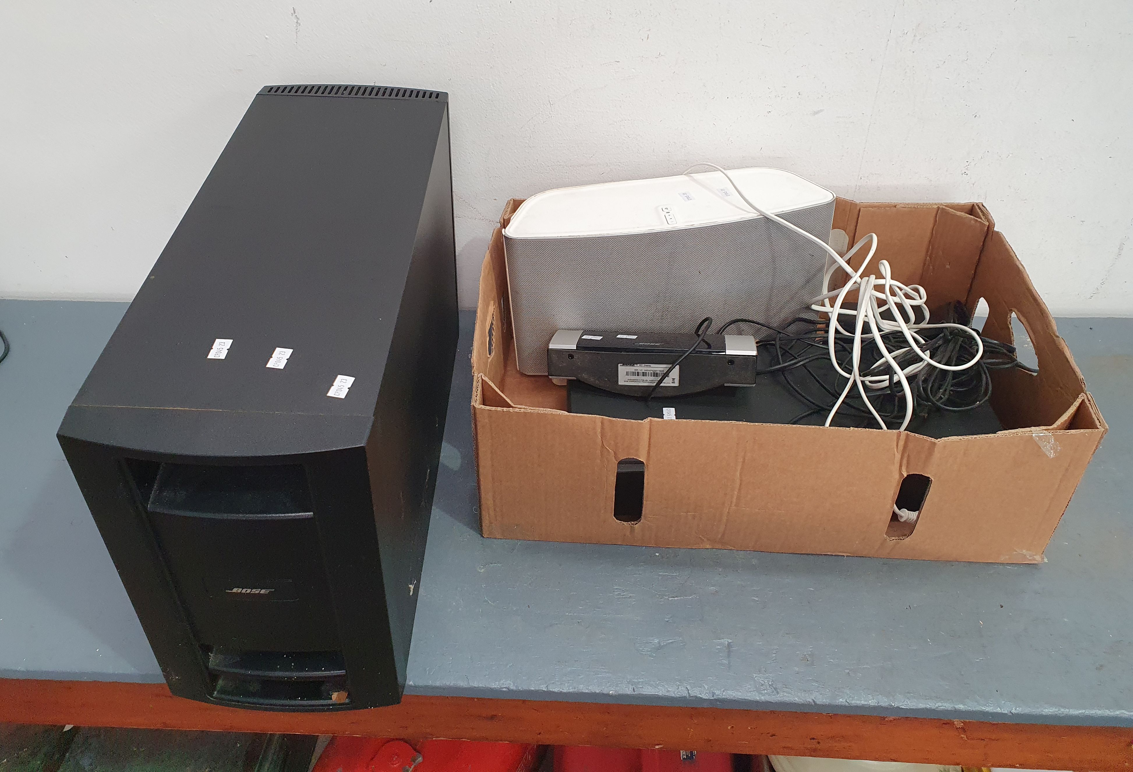 A Group Of Bose Speakers