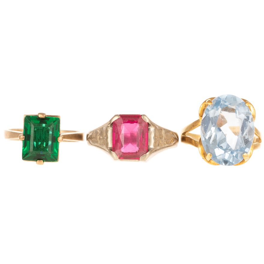 A Trio of Large Synthetic Gemstone Rings in Gold