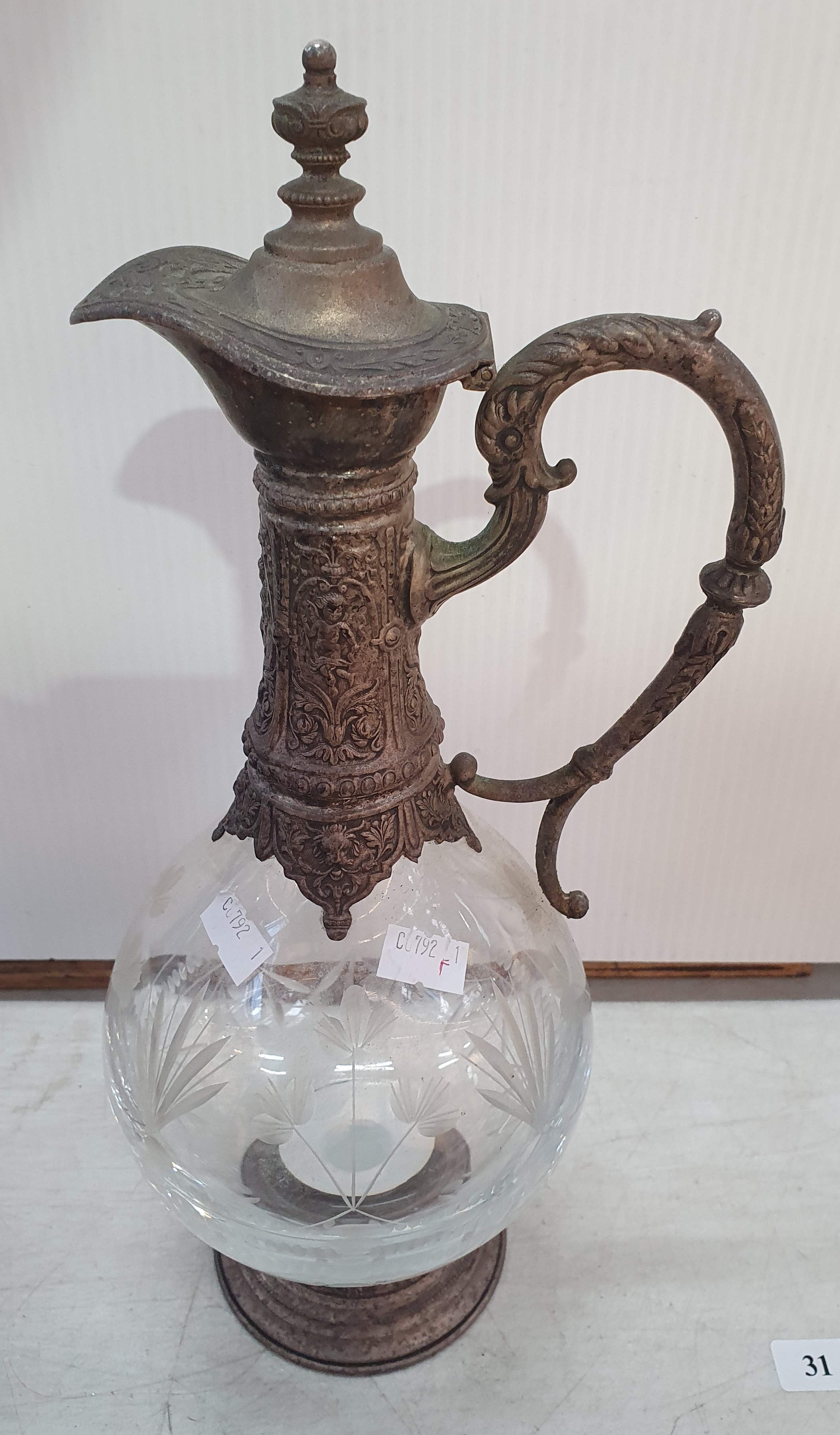 31 · A WHITEHILL SILVERPLATED AND ETCHED GLASS CLARET JUG