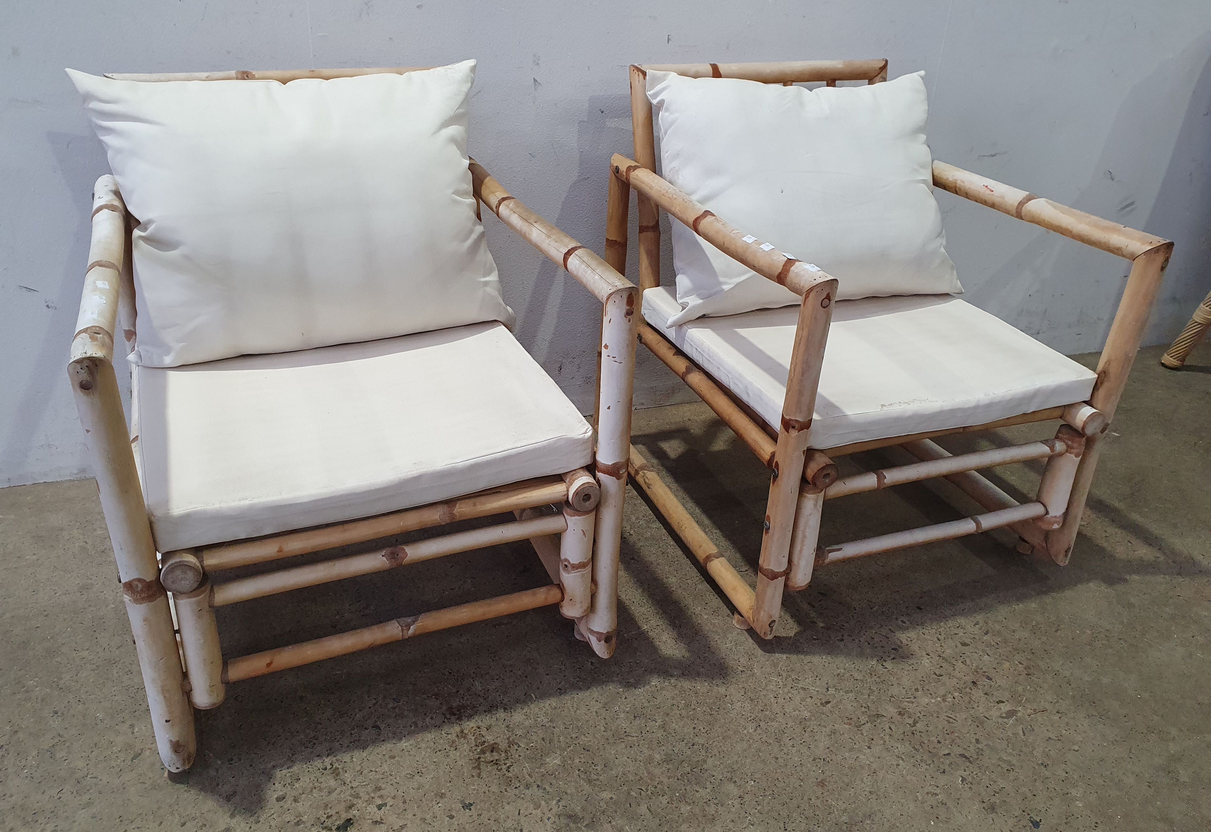 A Pair Of Cane Chairs