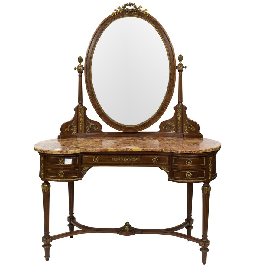 A Louis XVI style gilt bronze mounted dressing table