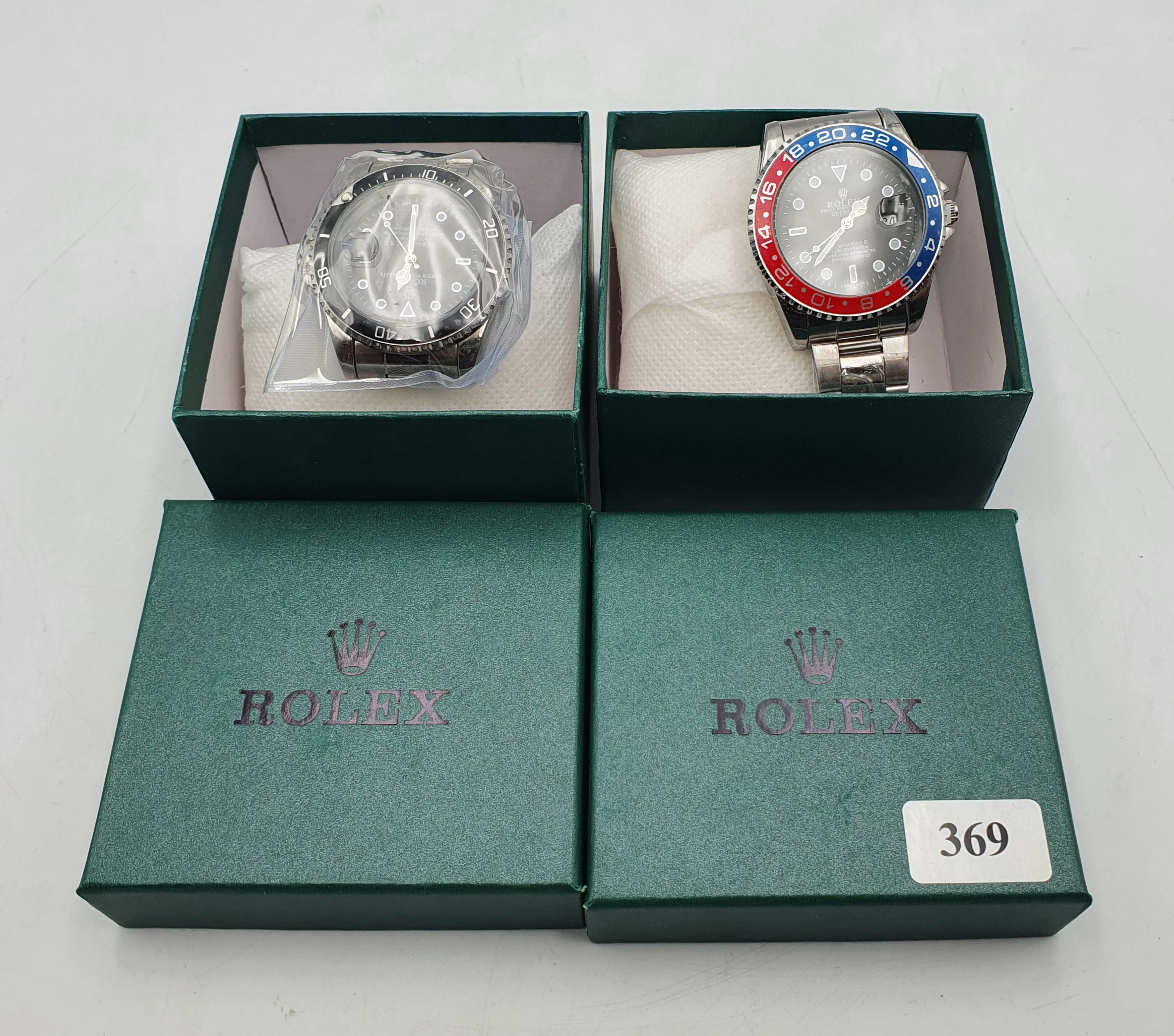 369 · TWO REPLICA WATCHES