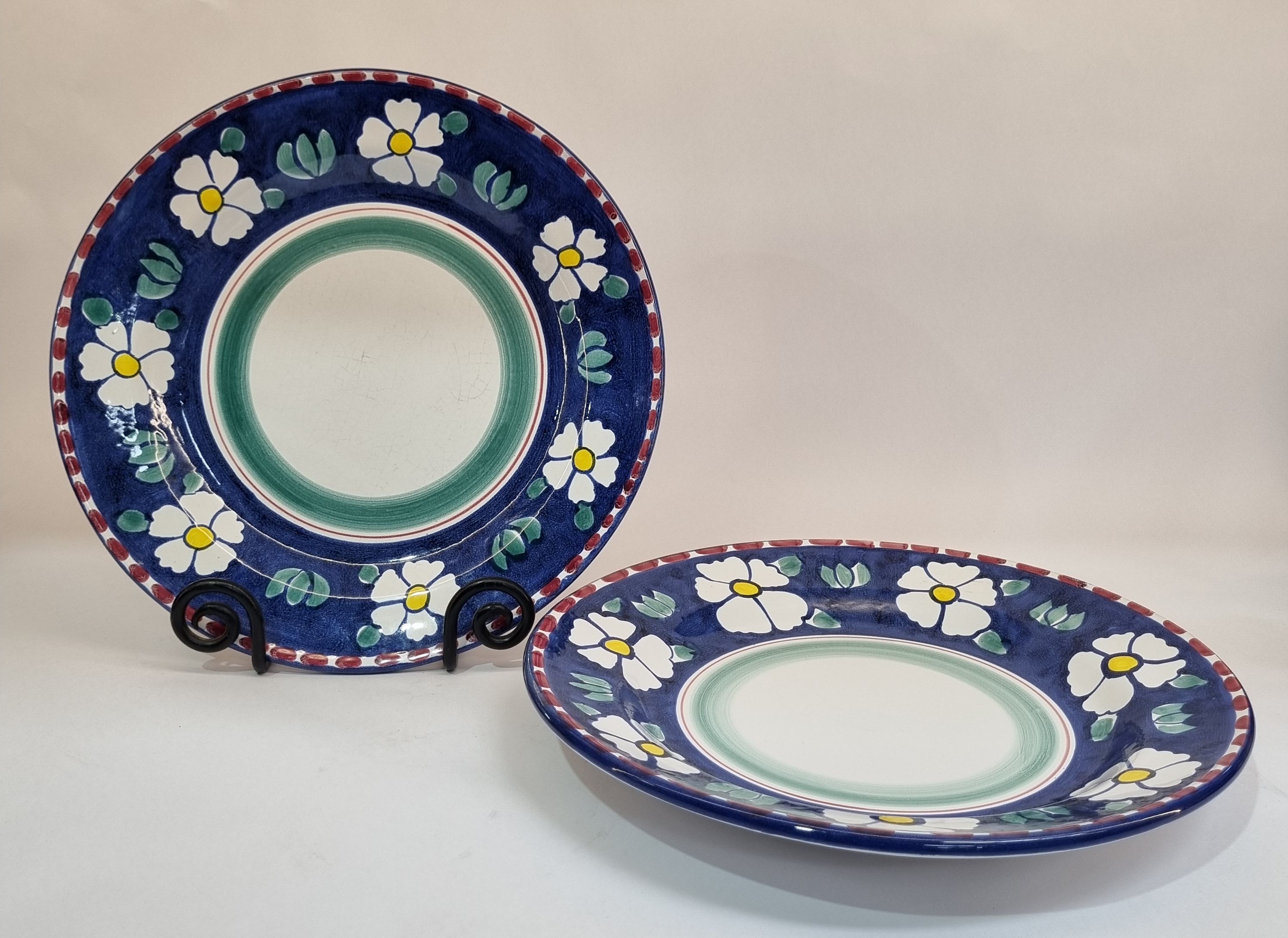 659 · A PAIR OF CORSO DE FIORI ITALIAN POTTERY CHARGERS