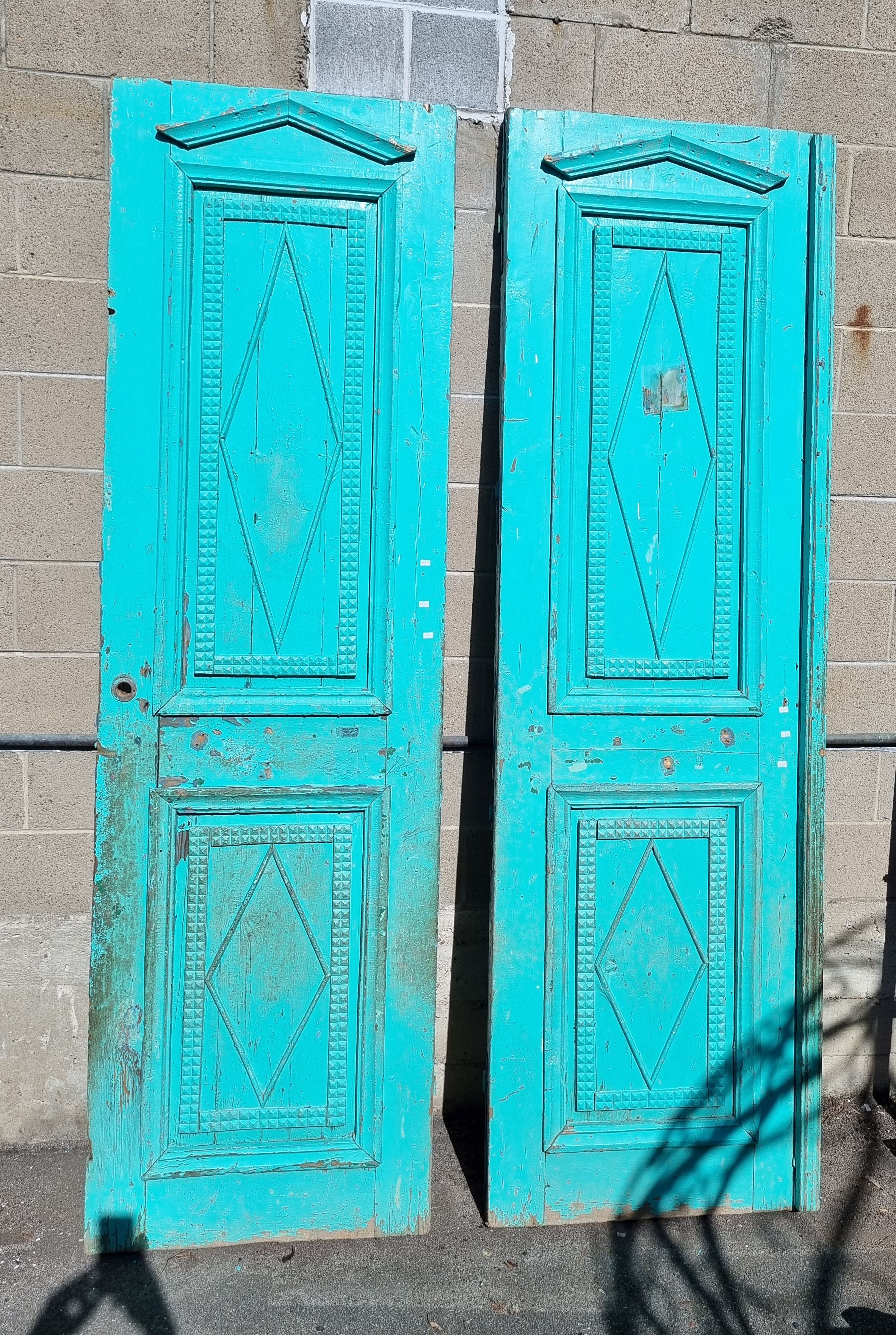 A Set Of Painted Rustic Doors