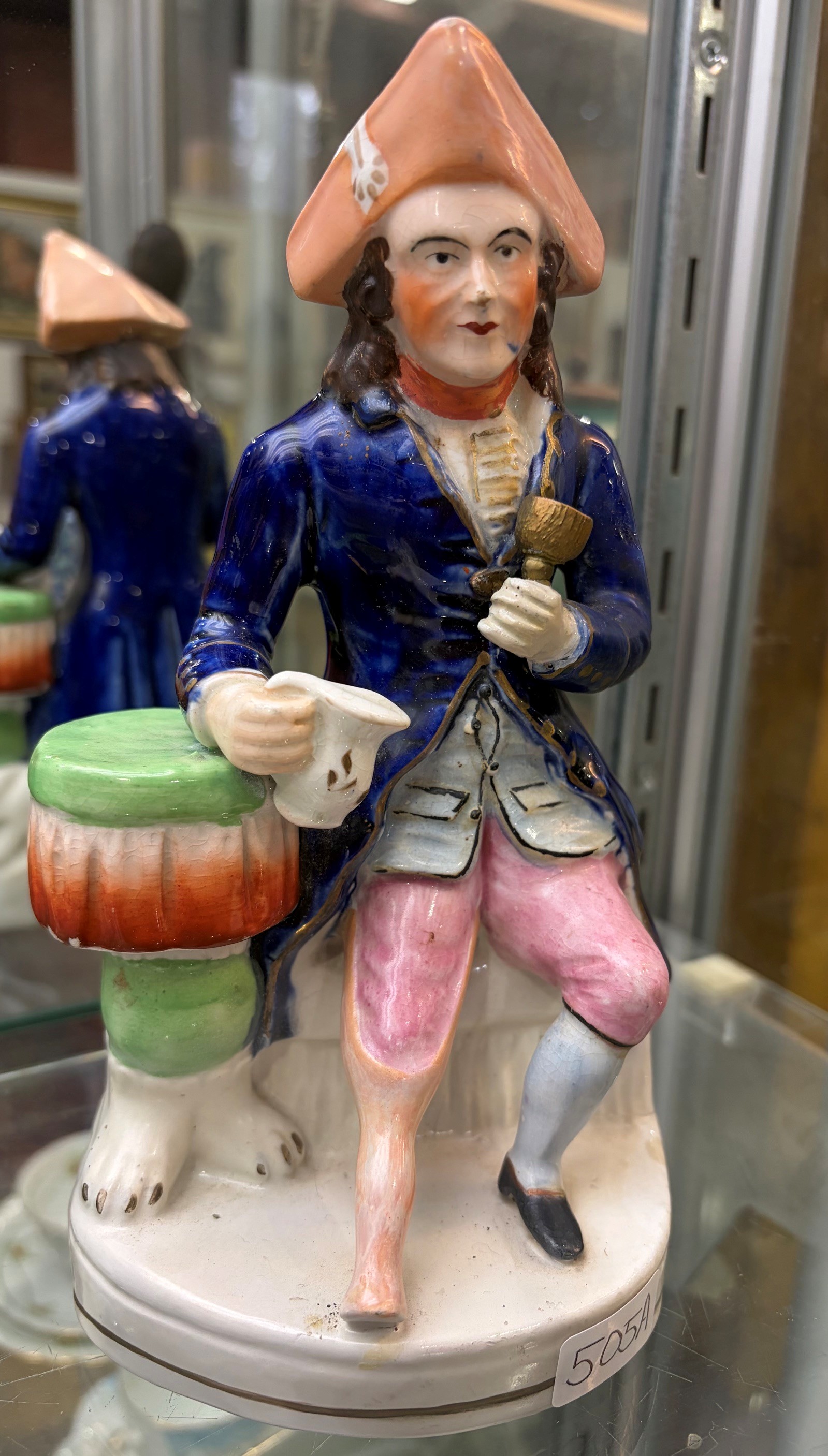 A VICTORIAN STAFFORDSHIRE POTTERY FIGURE