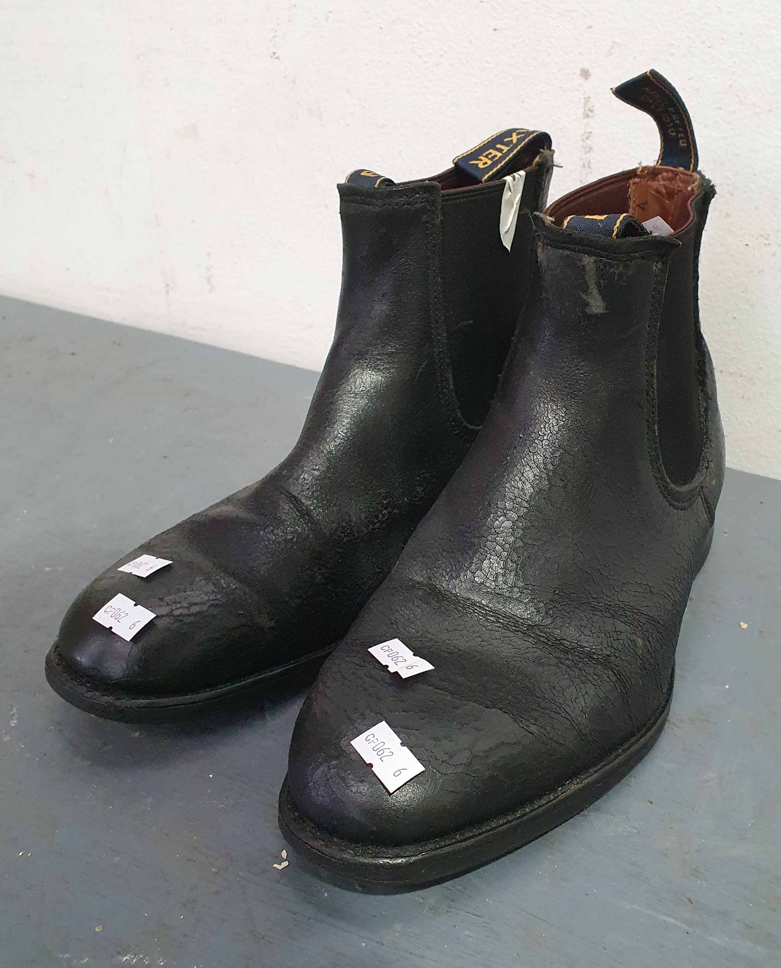 A Pair Of Men'S Black Baxter Boots