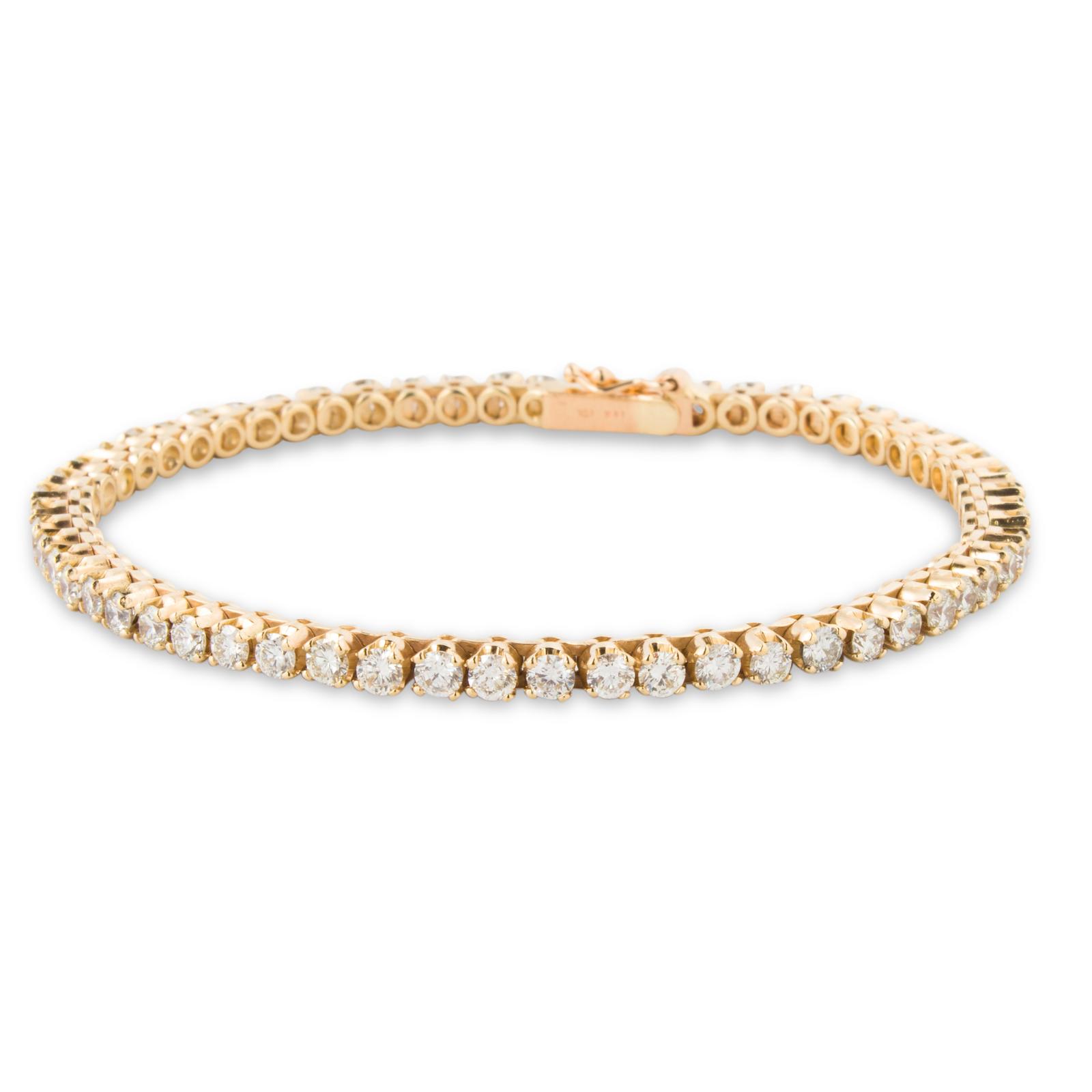 A diamond and fourteen karat gold bracelet | Clars Auction Gallery