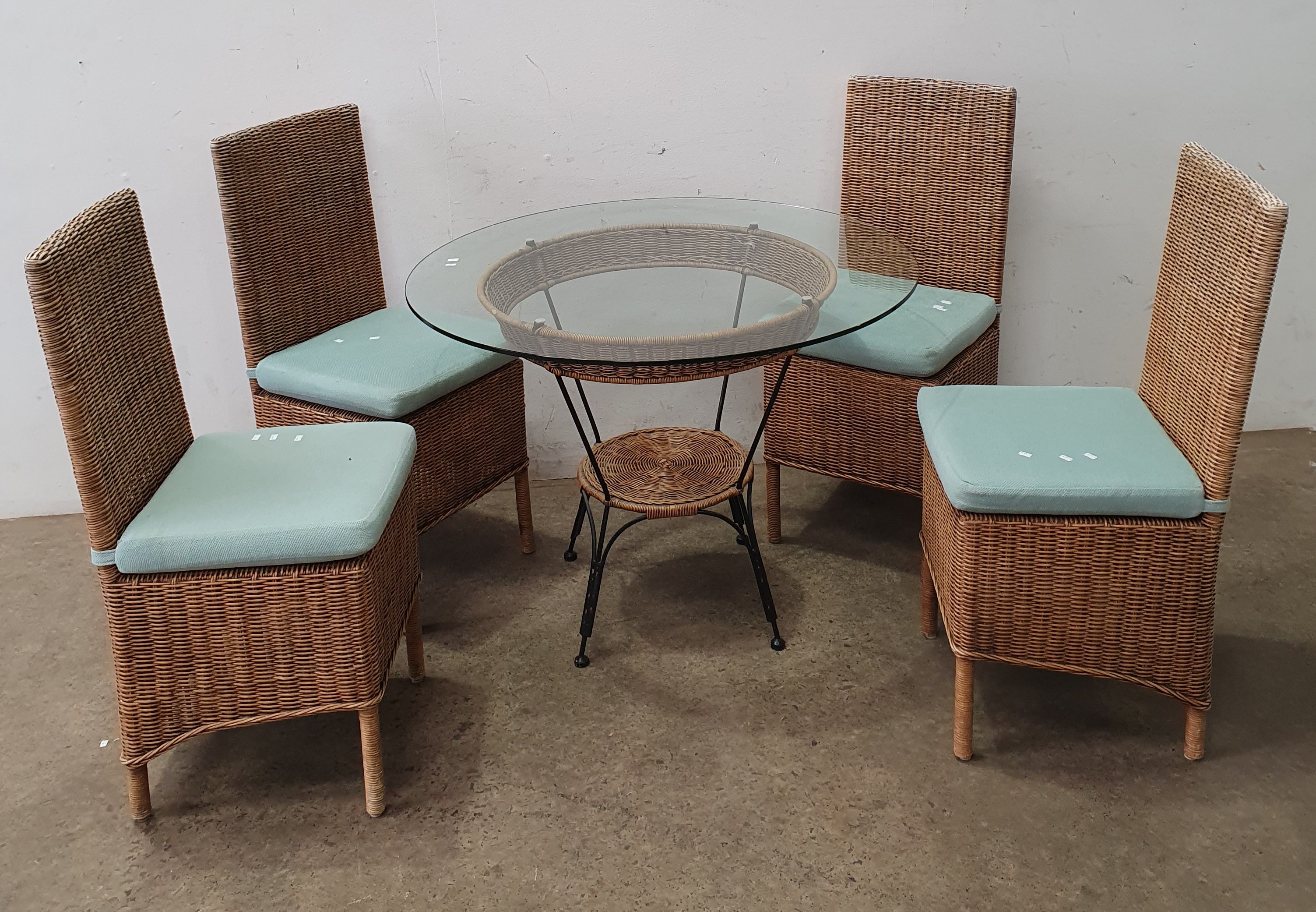 A Five Piece Woven Cane Veranda Setting
