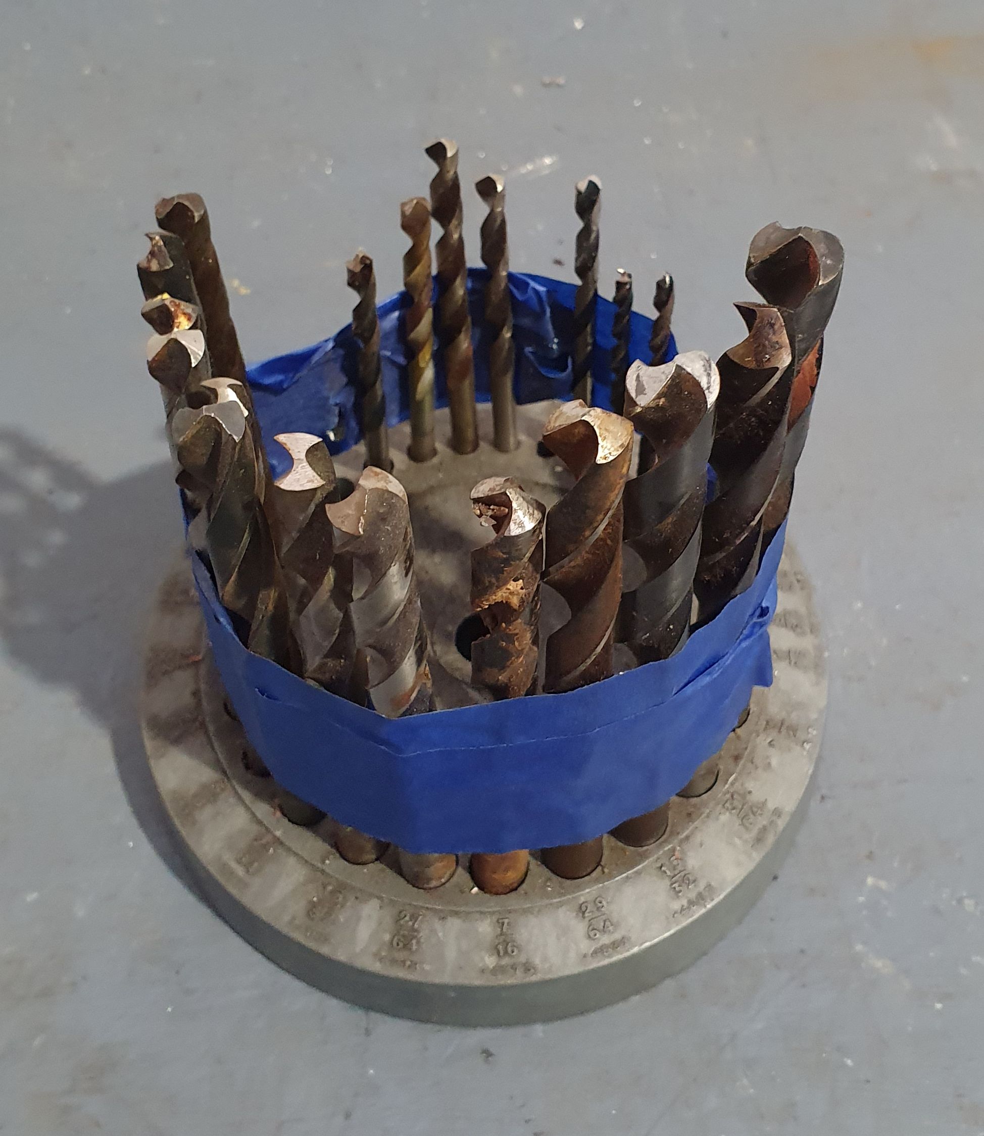A GROUP OF DRILL BITS