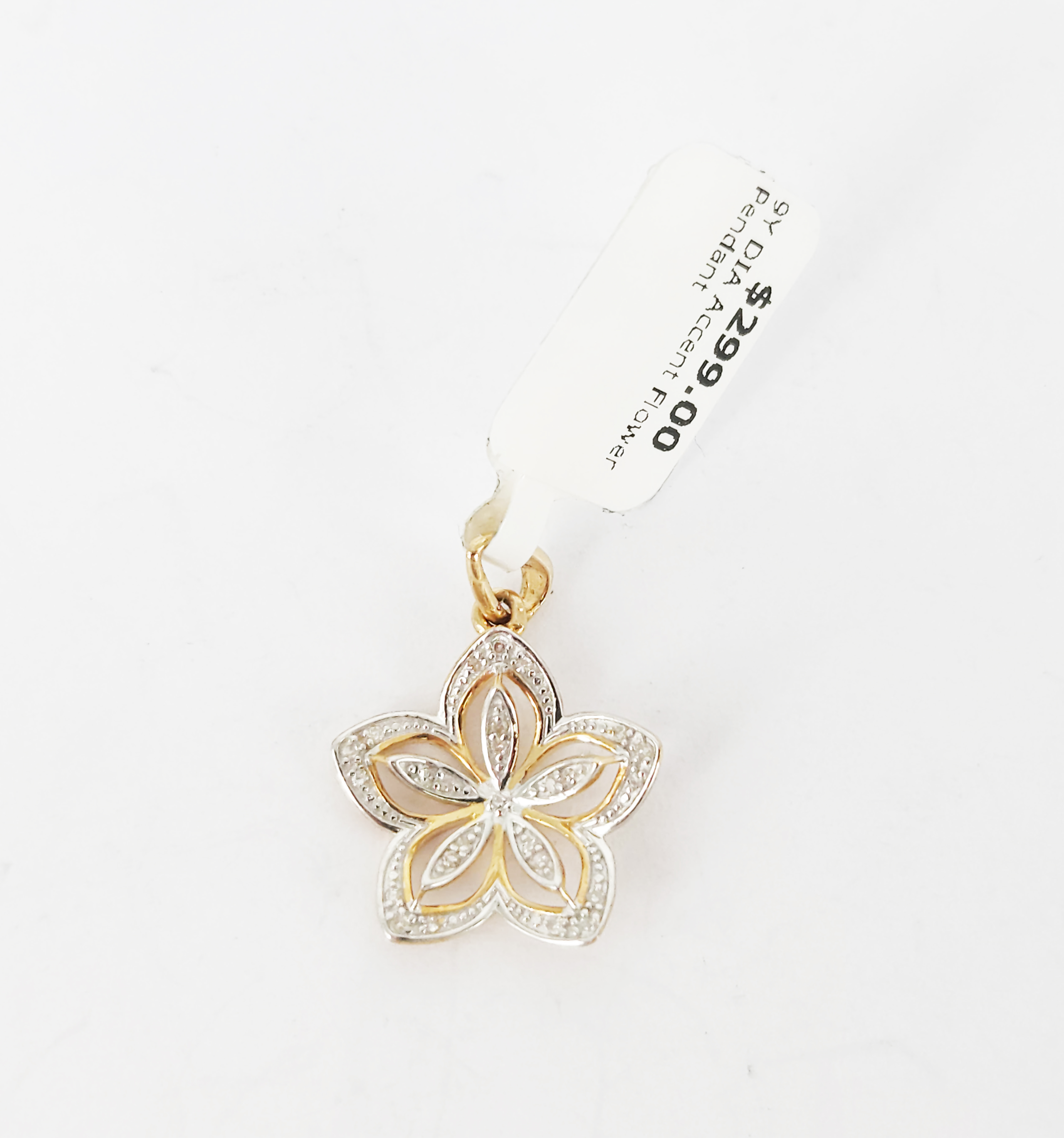 A 9ct Yellow Gold Diamond Accent Flower Pendant
