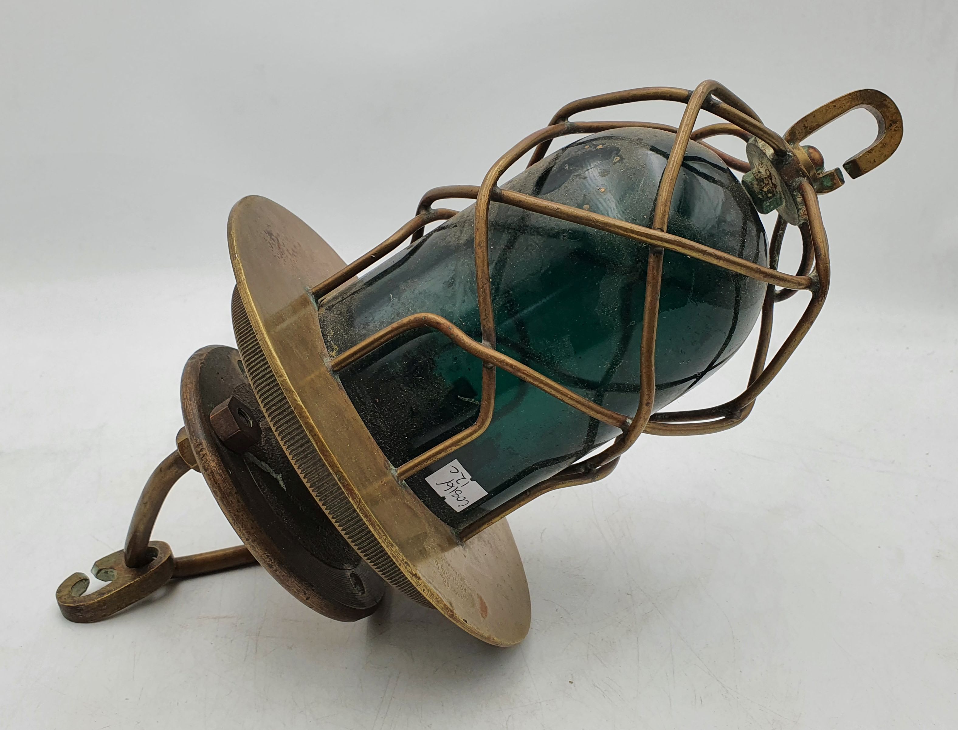 An Antique Brass Maritime Bulkhead Light