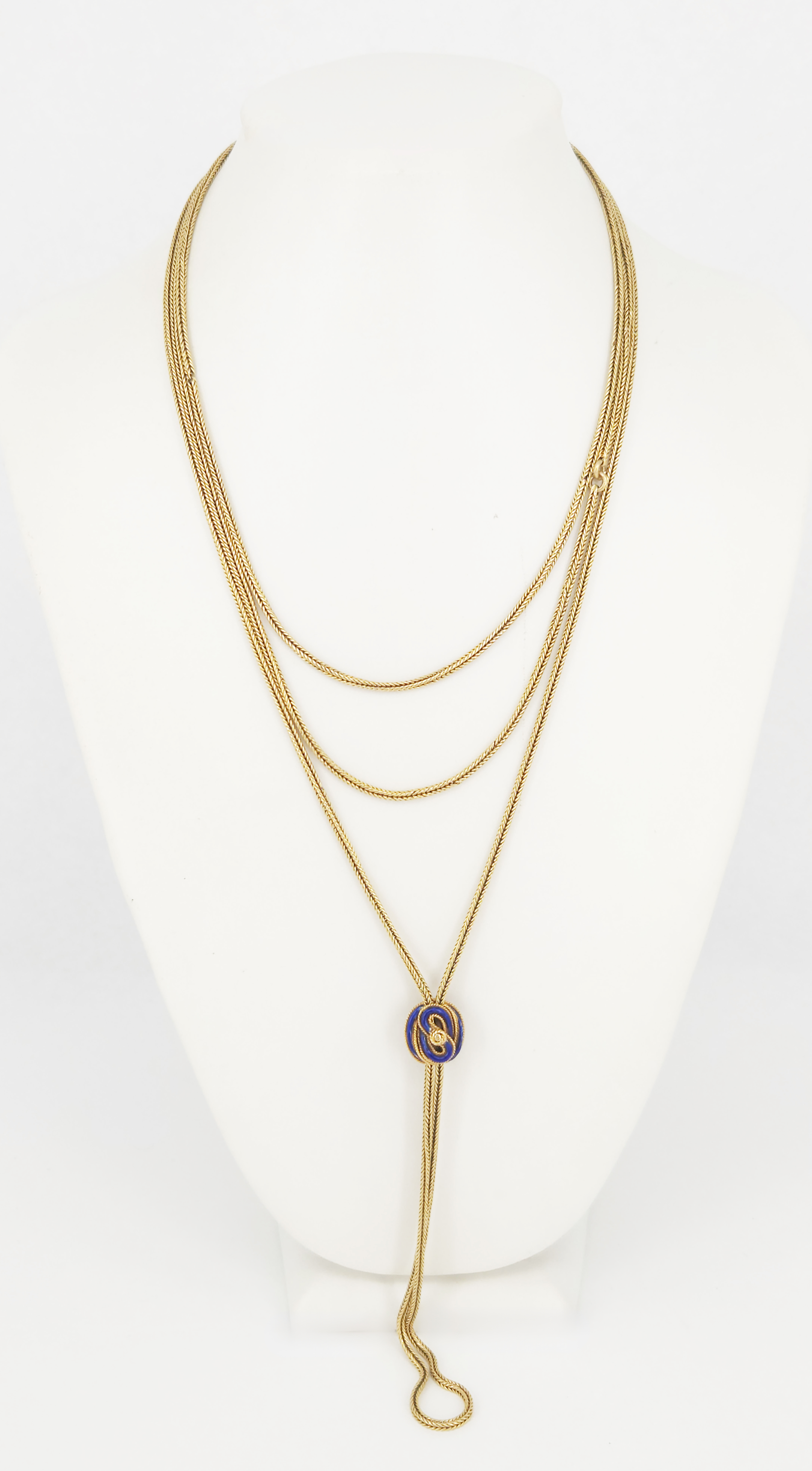 169 · A LONG YELLOW GOLD SPIGA-LINK CHAIN