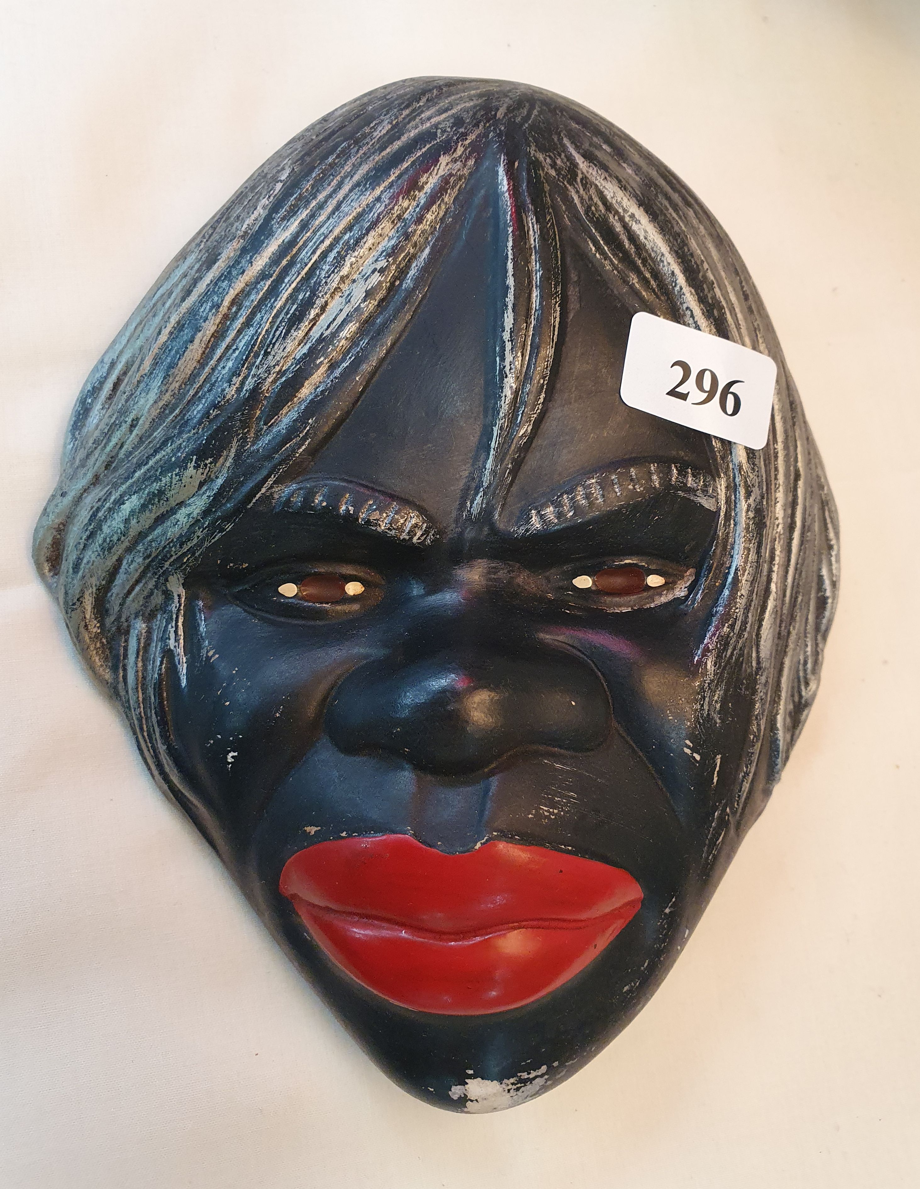 296 · A MID-20th CENTURY ALVA STONE ABORIGINAL FACE WALL PLAQUE