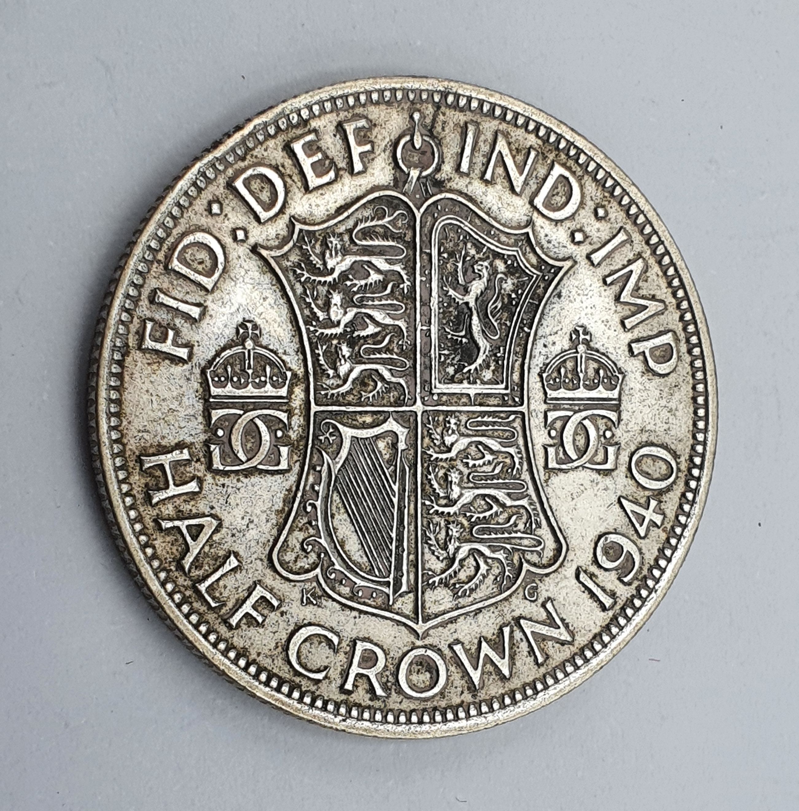 200 · A BRITISH SILVER 1940 UNC HALF CROWN