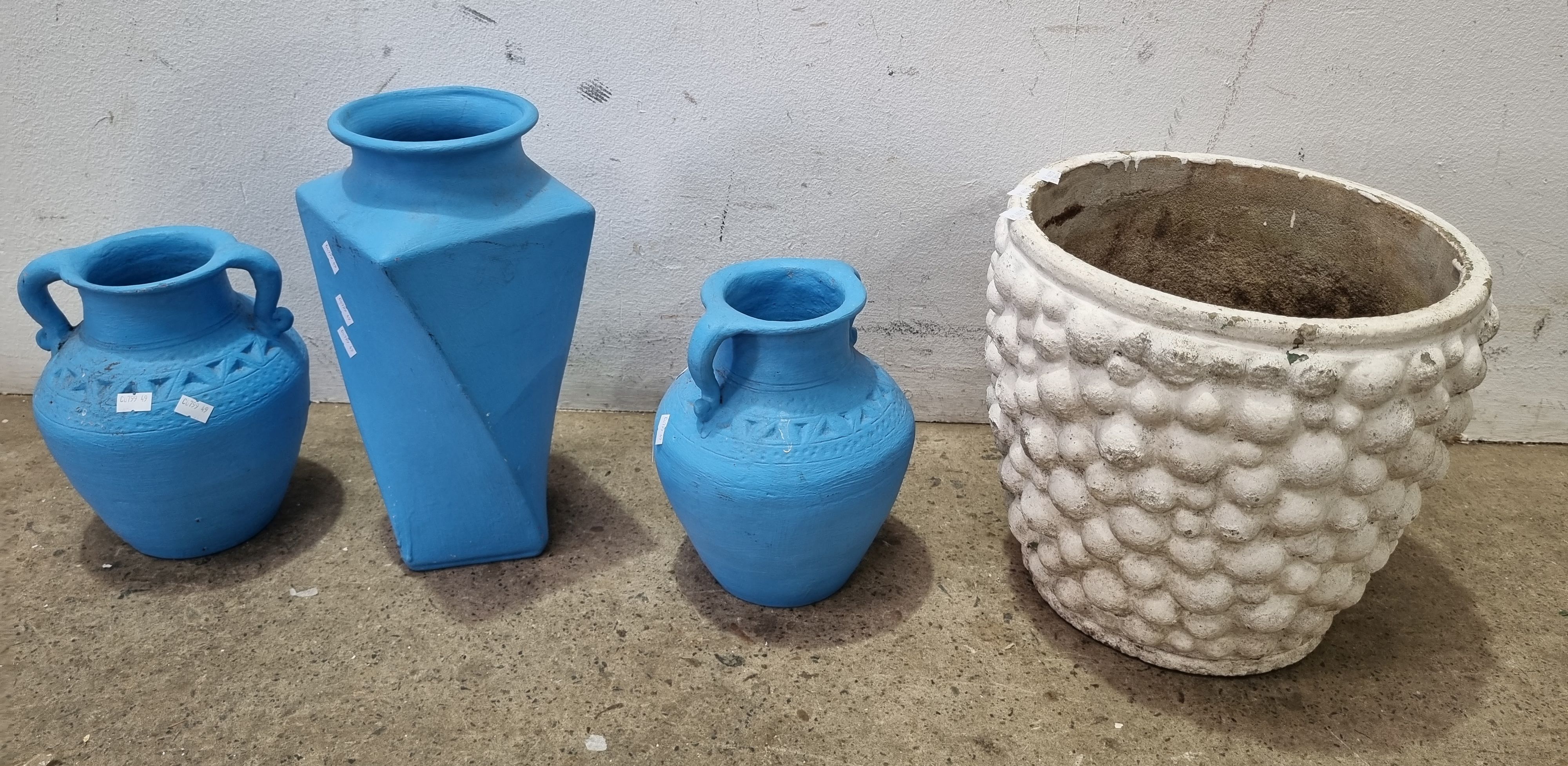 1112 · A TRIO OF BLUE PAINTED TERRACOTTA POTS