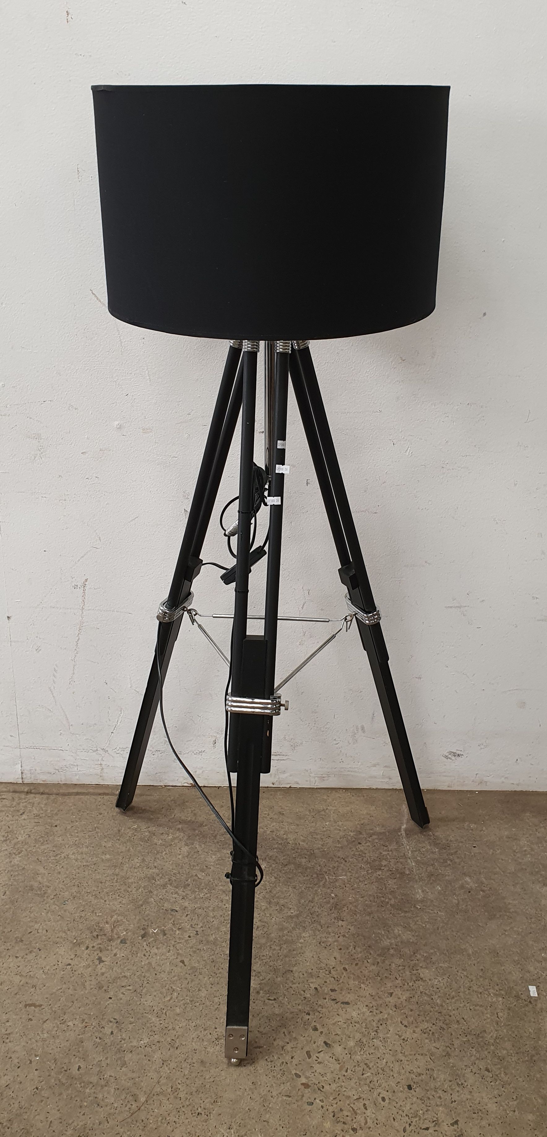 A TRIPOD STANDARD LAMP