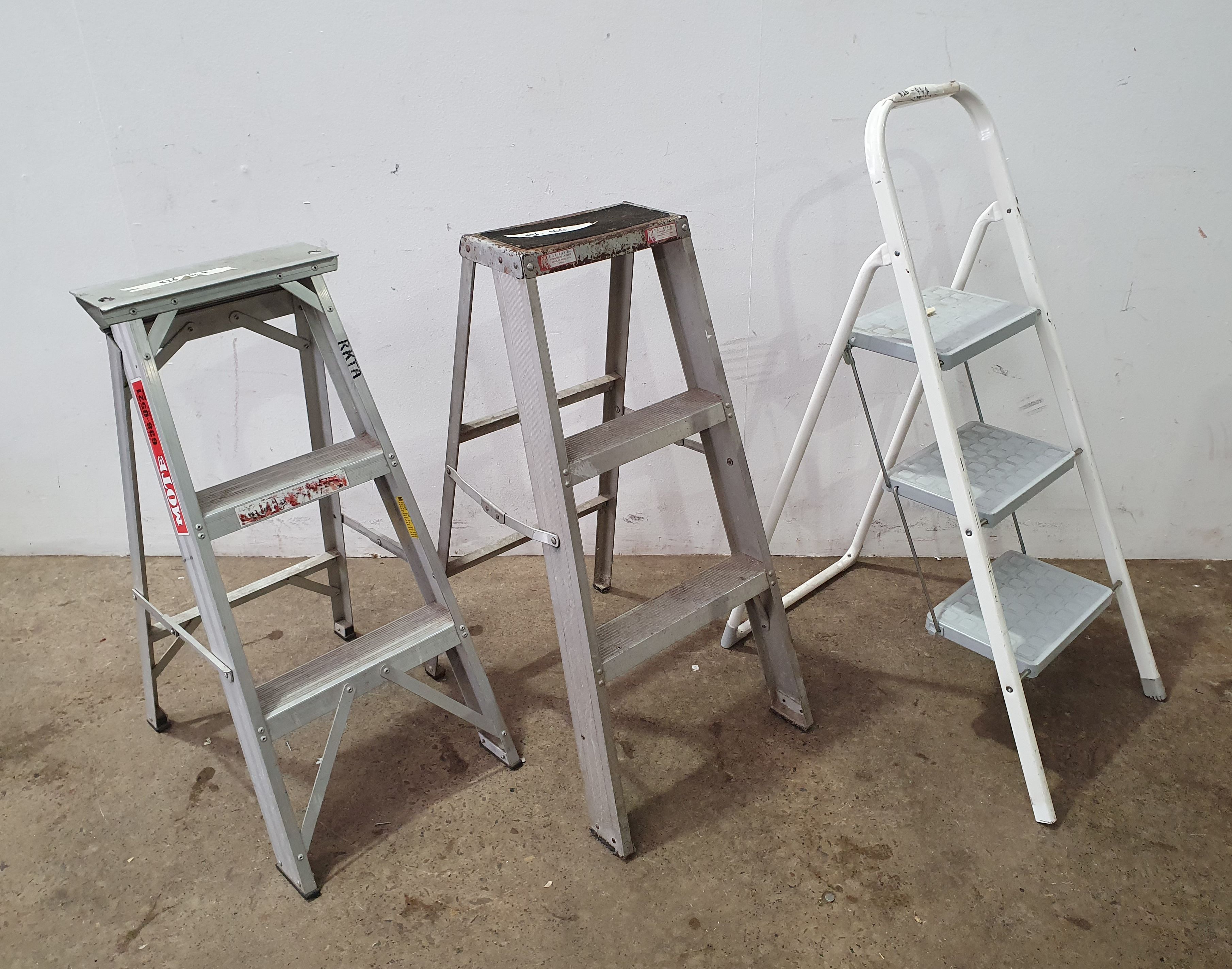 1012 · THREE VARIOUS ALUMINIUM LADDERS