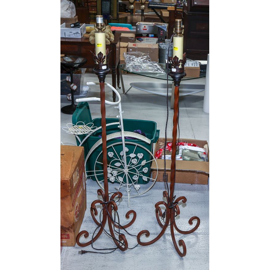 A Pair of Wrought Iron Torchere Floor Lamps