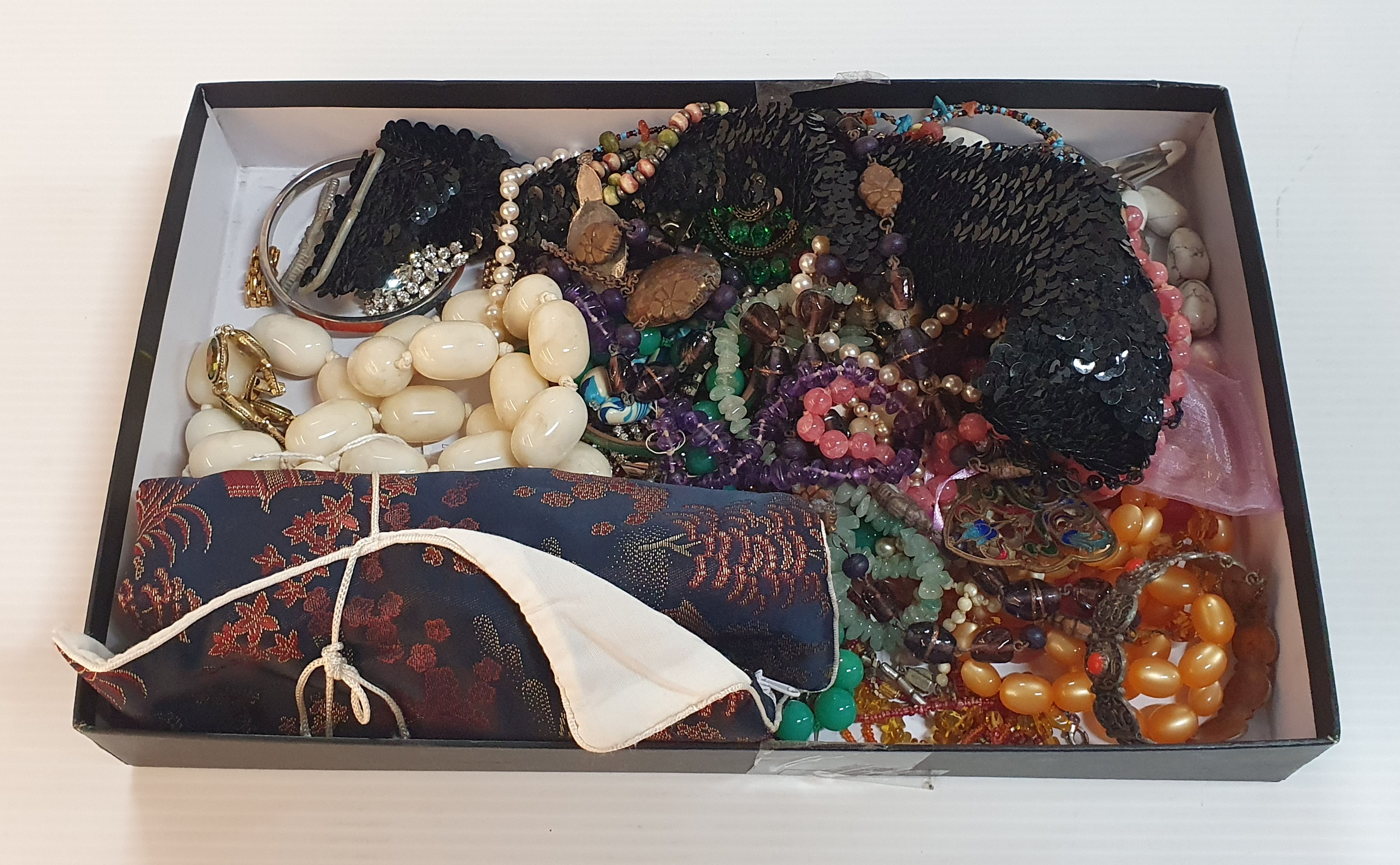 310 · A QUANTITY OF COSTUME JEWELLERY