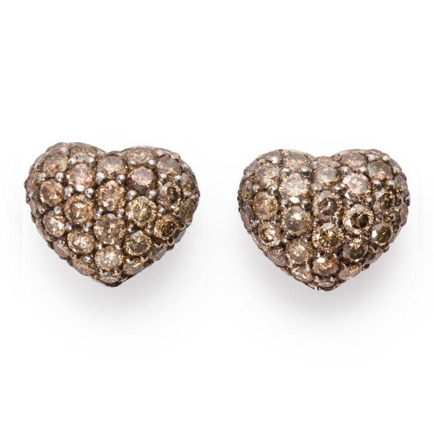 A pair of champagne diamond and eighteen karat white gold stud earrings