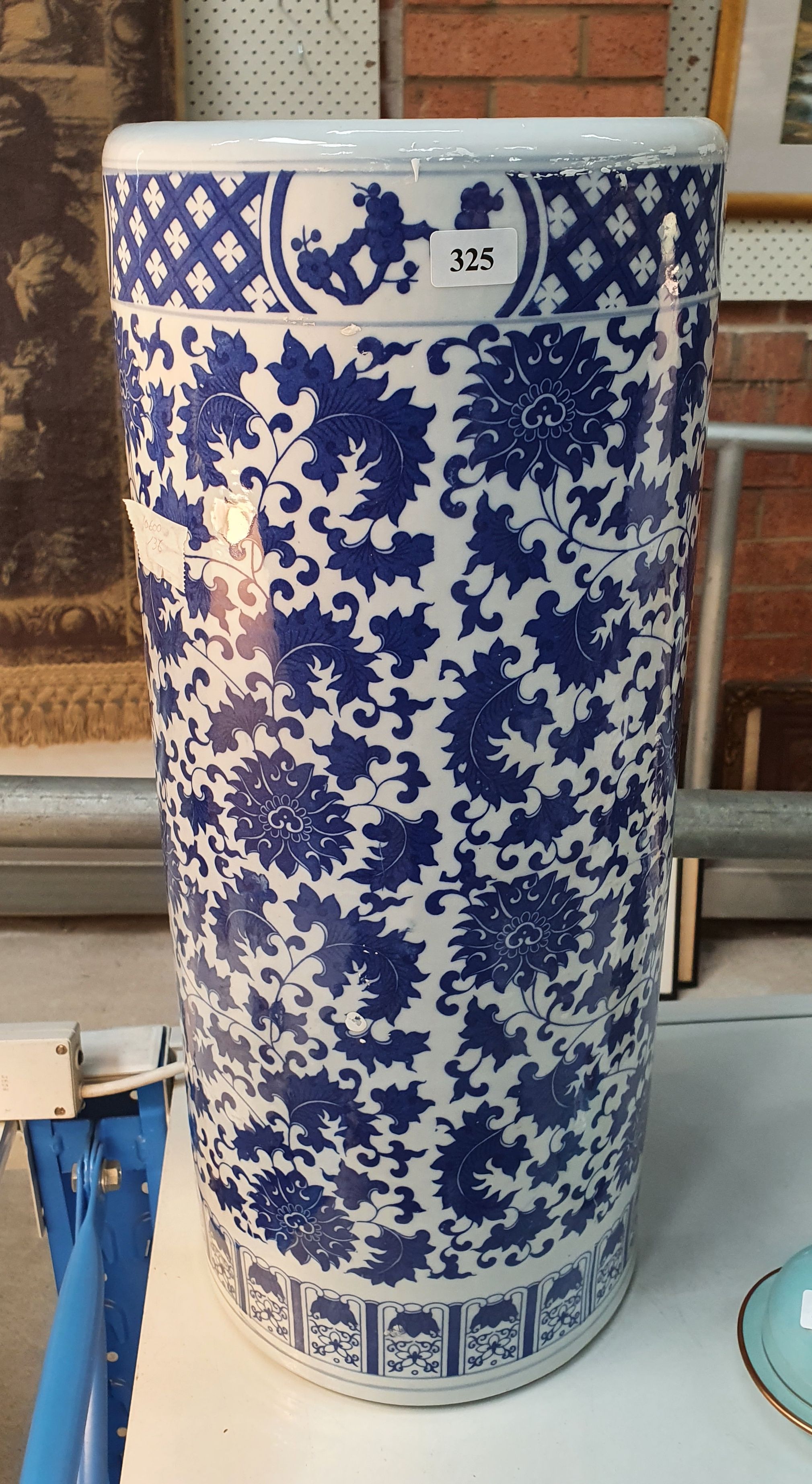 325 · A PORCELAIN BLUE AND WHITE UMBRELLA STAND