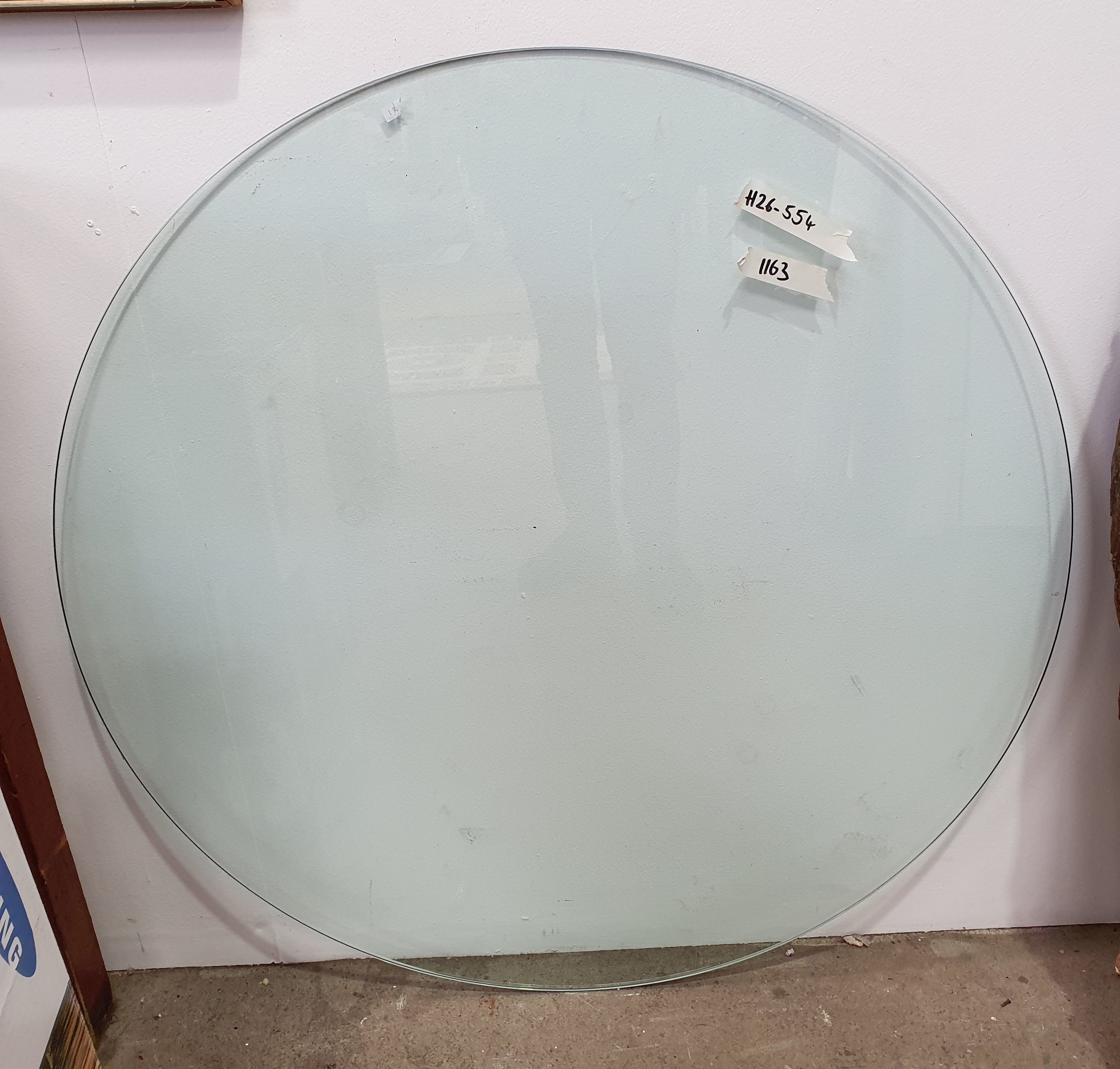 a round glass table top
