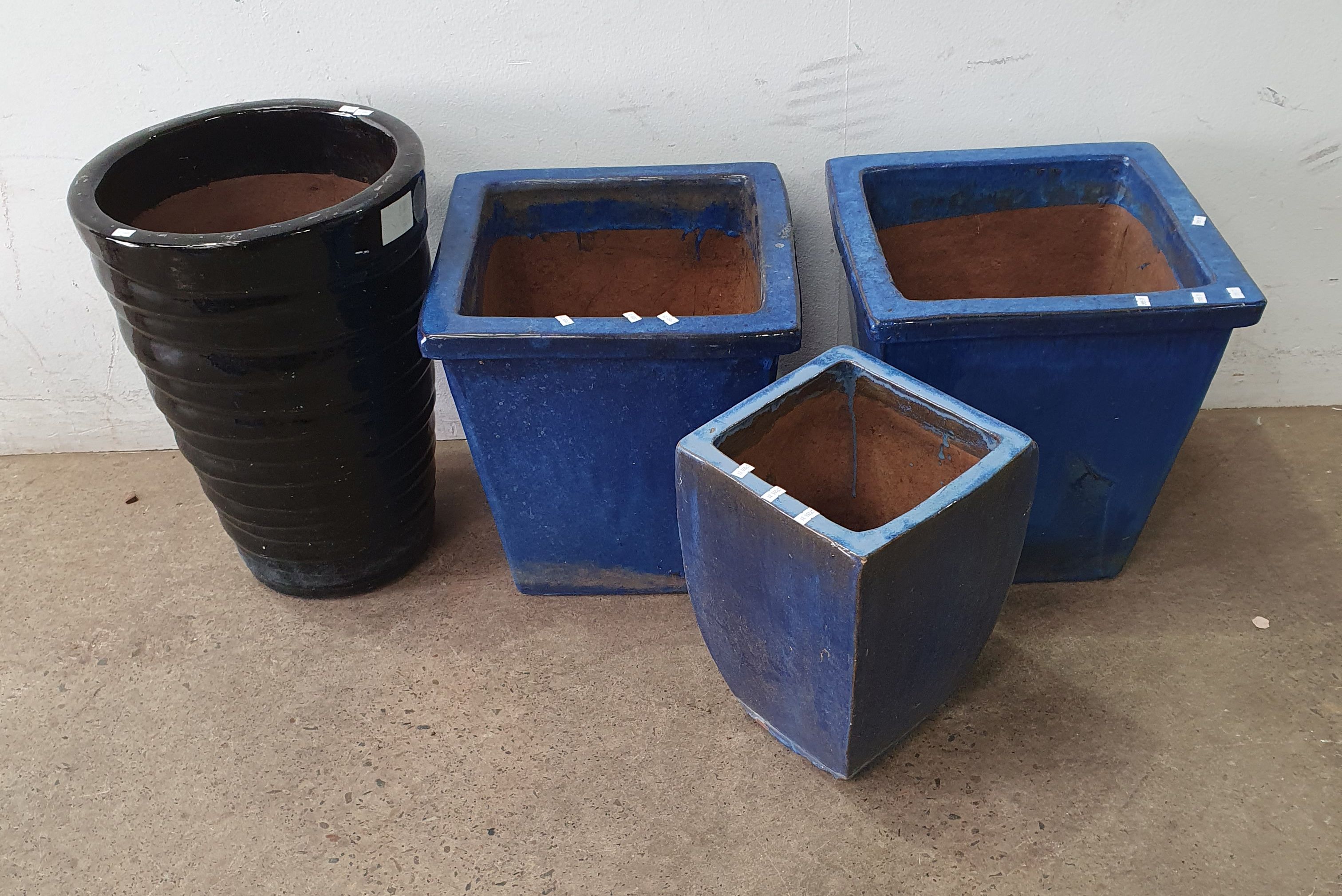 A Group Of Glazed Pots
