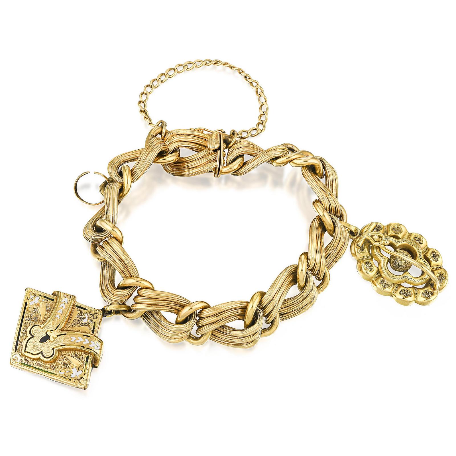 Sold at Auction: 14k gold charm bracelet