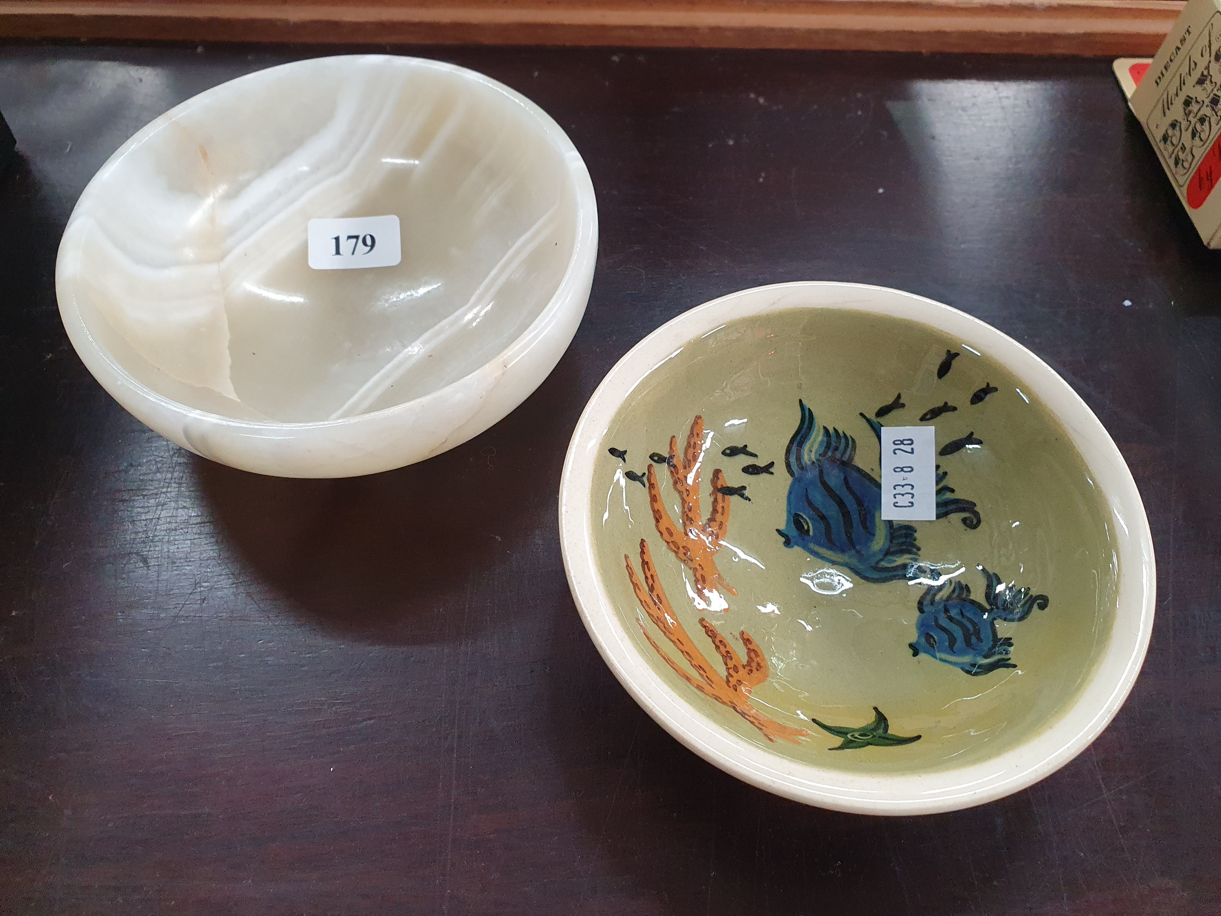 179 · A SMALL MARBLE BOWL TOGETHER WITH A MARTIN BOYD EXAMPLE