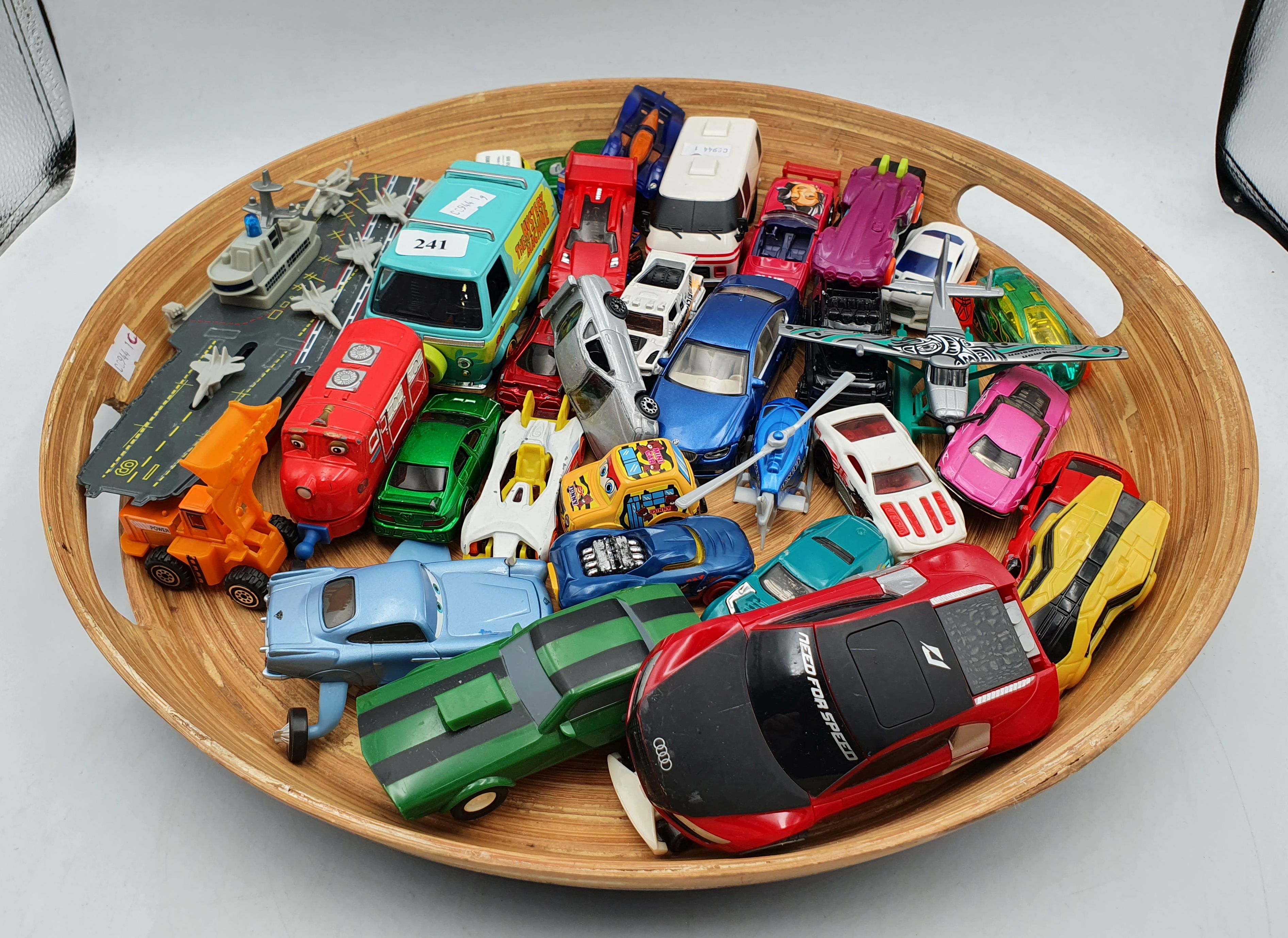 241 · A COLLECTION OF DIE-CAST MODEL VEHICLES ON A TRAY