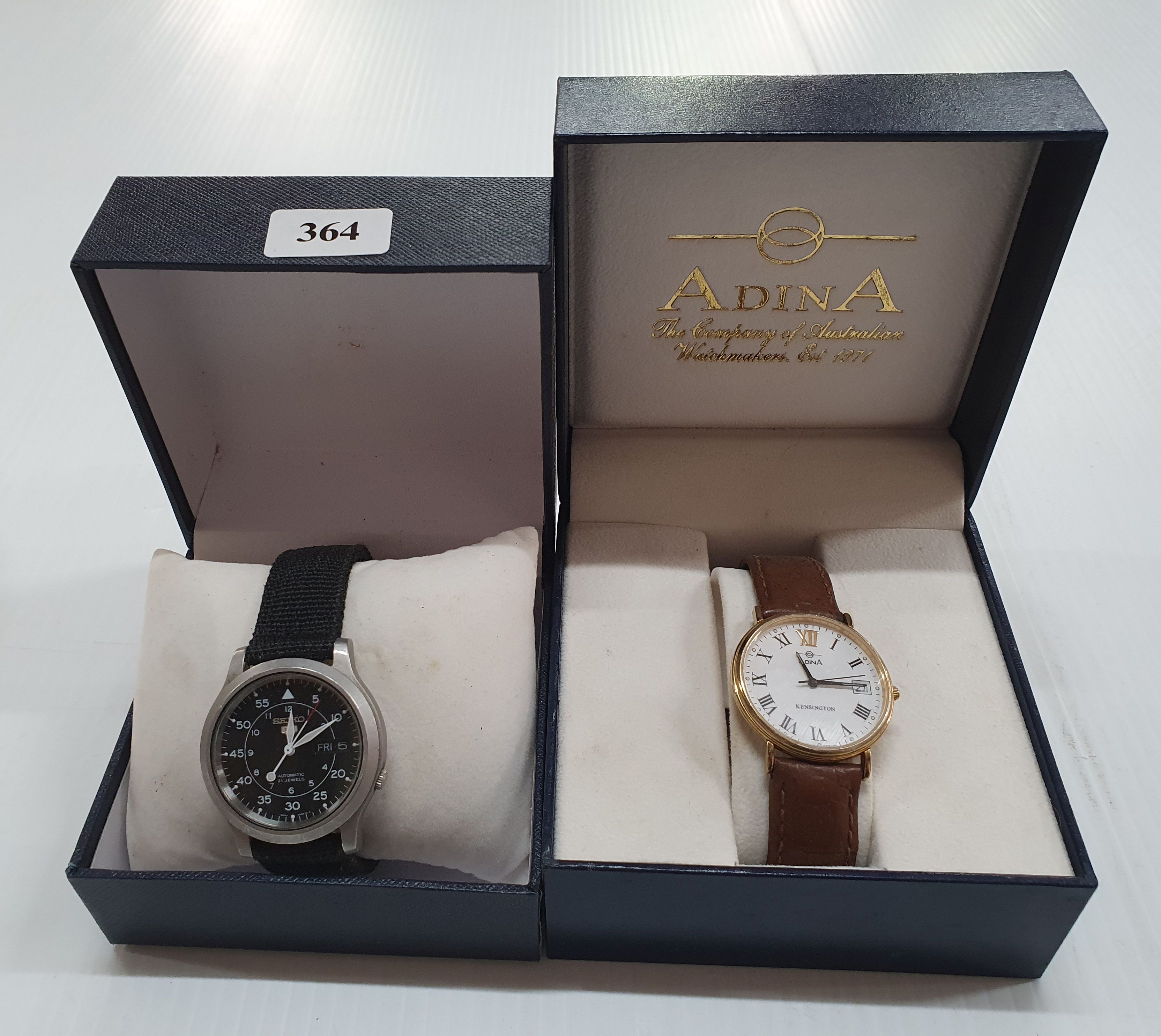 A CASED ADINA KENSINGTON WRISTWATCH & SEIKO MILITARY STYLE WATCH