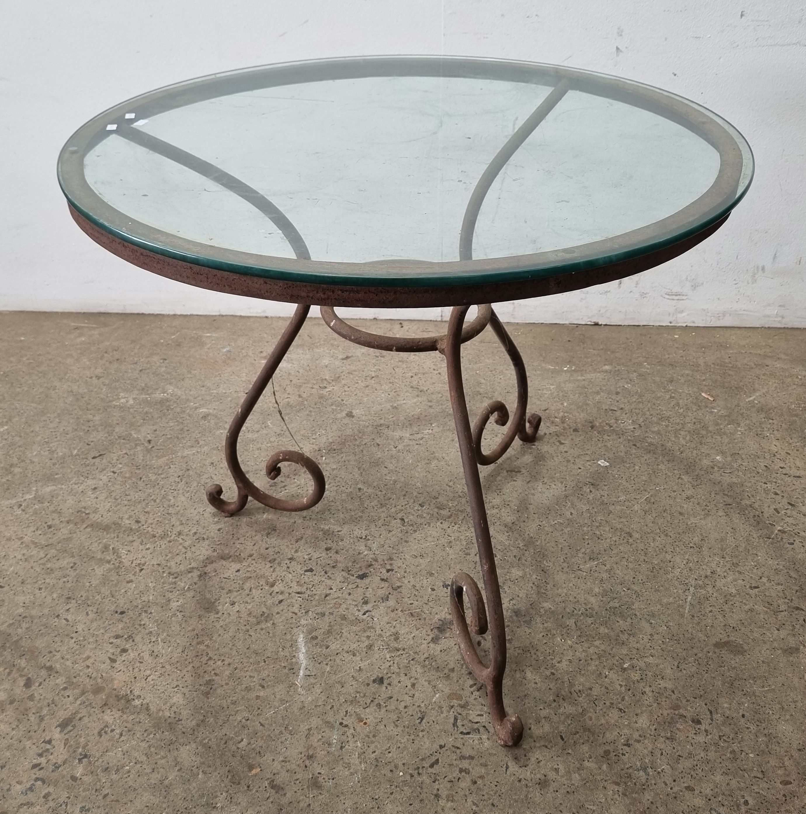 A Glass Top Outdoor Table