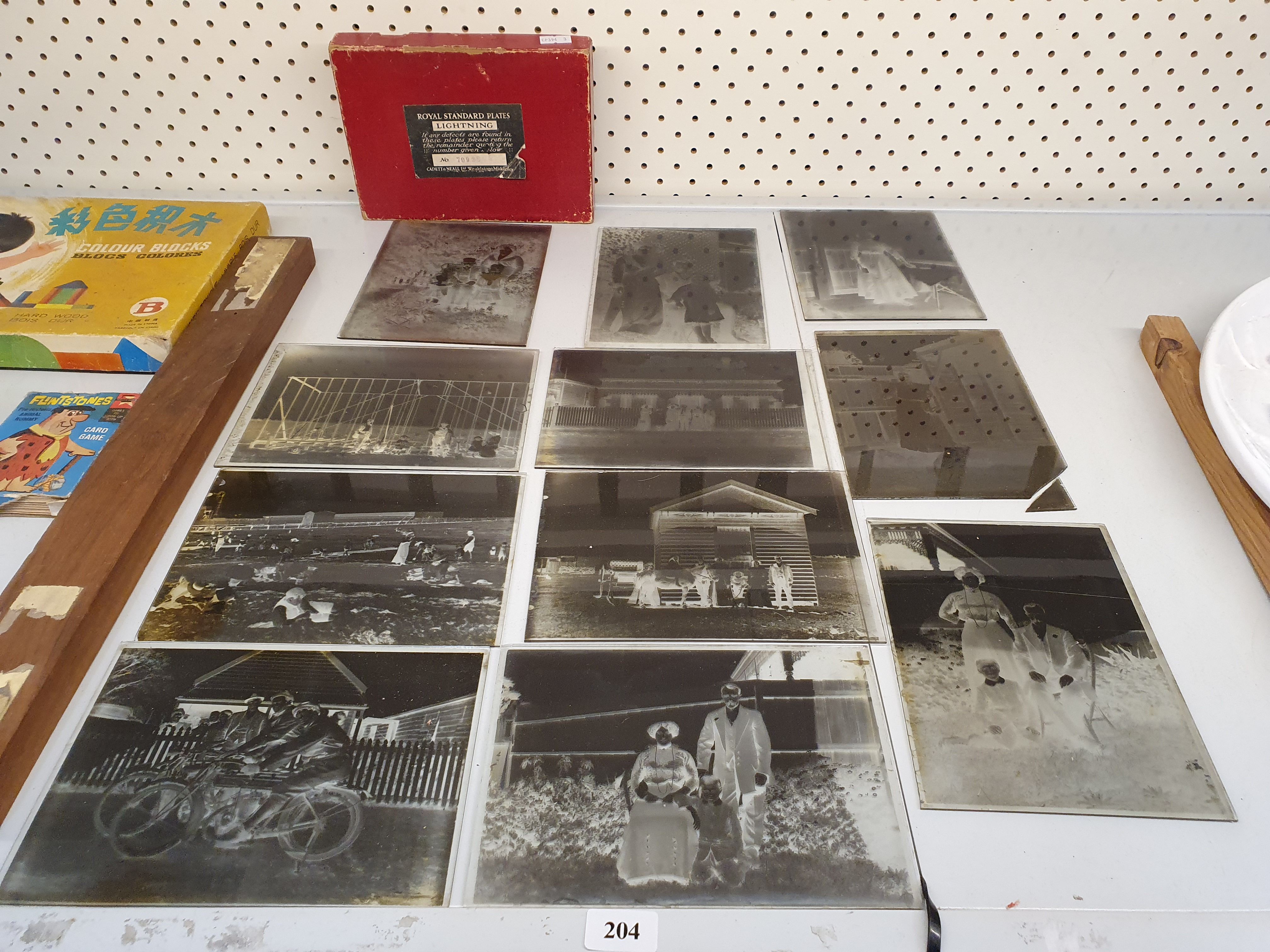 204 · A BOX OF GLASS NEGATIVES