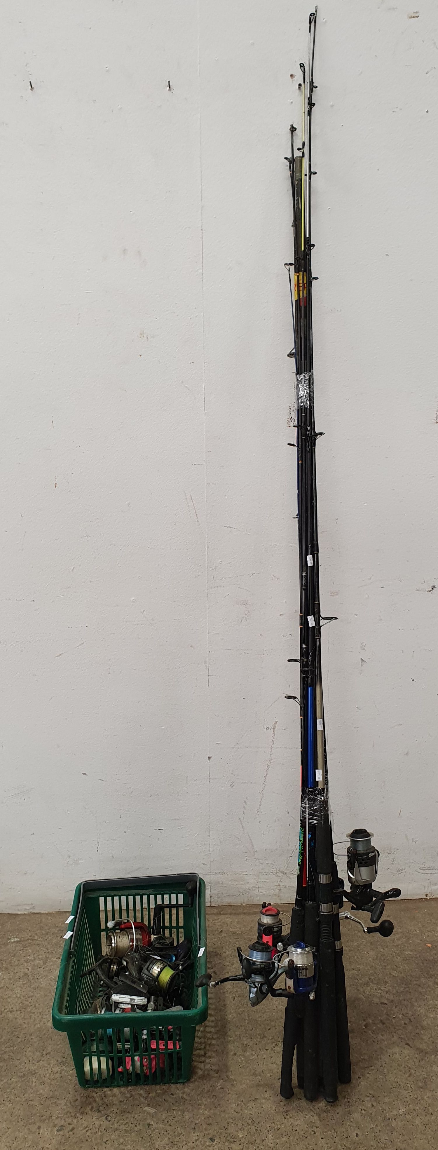 A GROUP OF RODS AND REELS